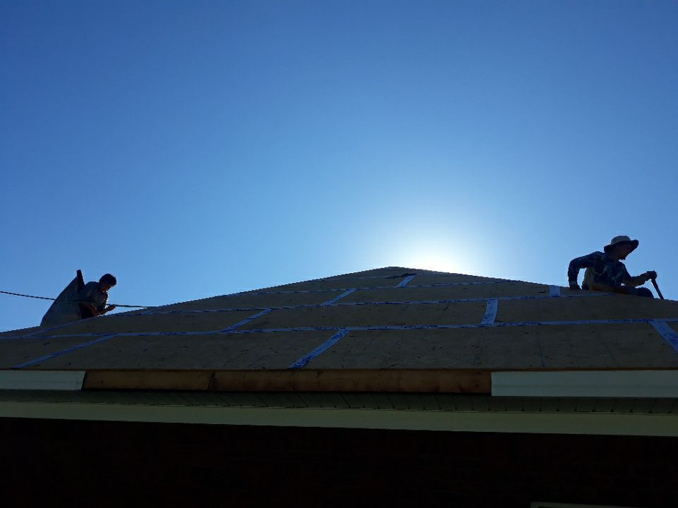 Residential Roofing Installation using Roof Replacement by American Roofing & Construction LLC