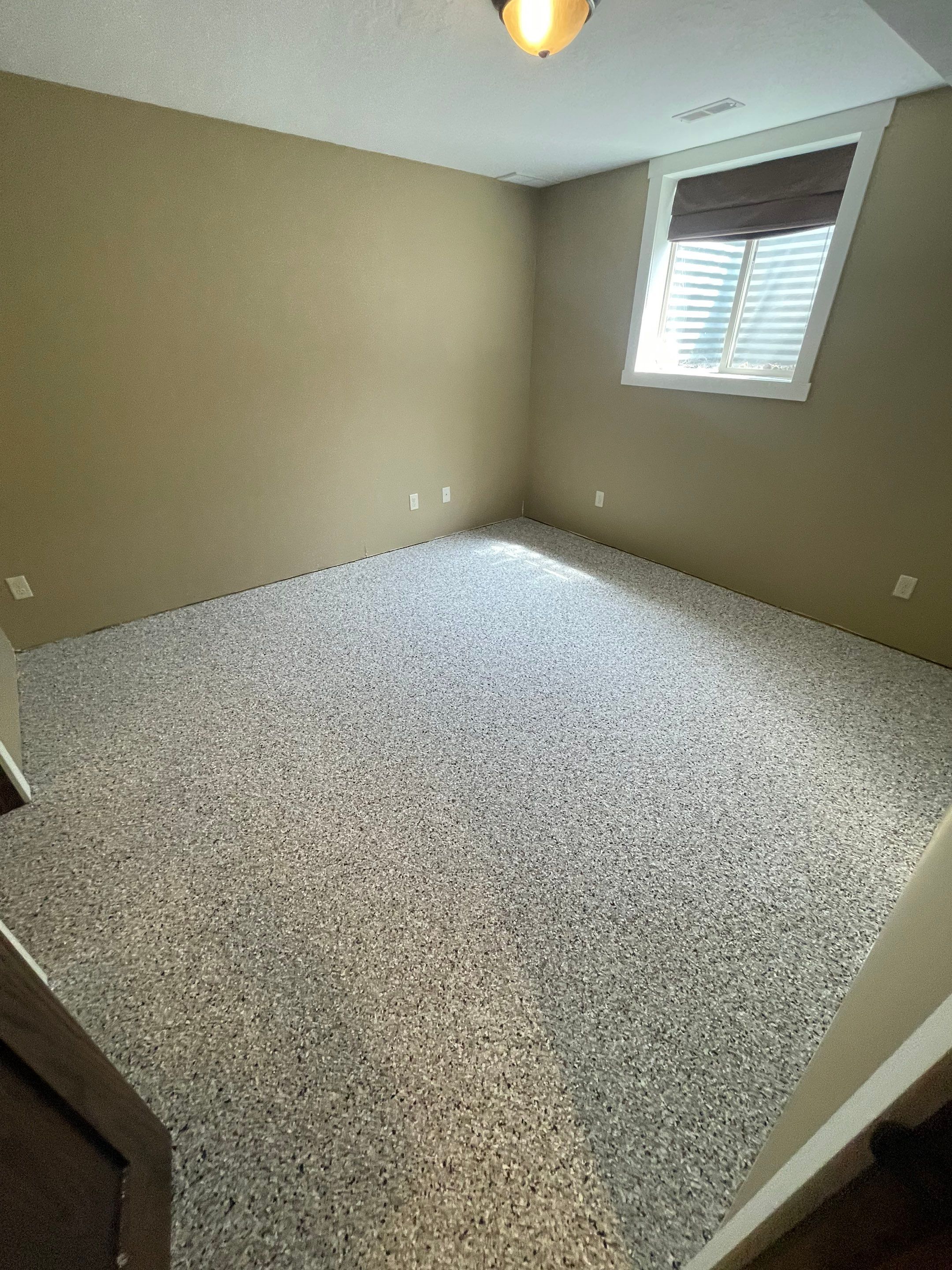 Decorative Flake Concrete Floor Coating for Larchwood Basement by Select Painting, Coatings & Garage Cabinets