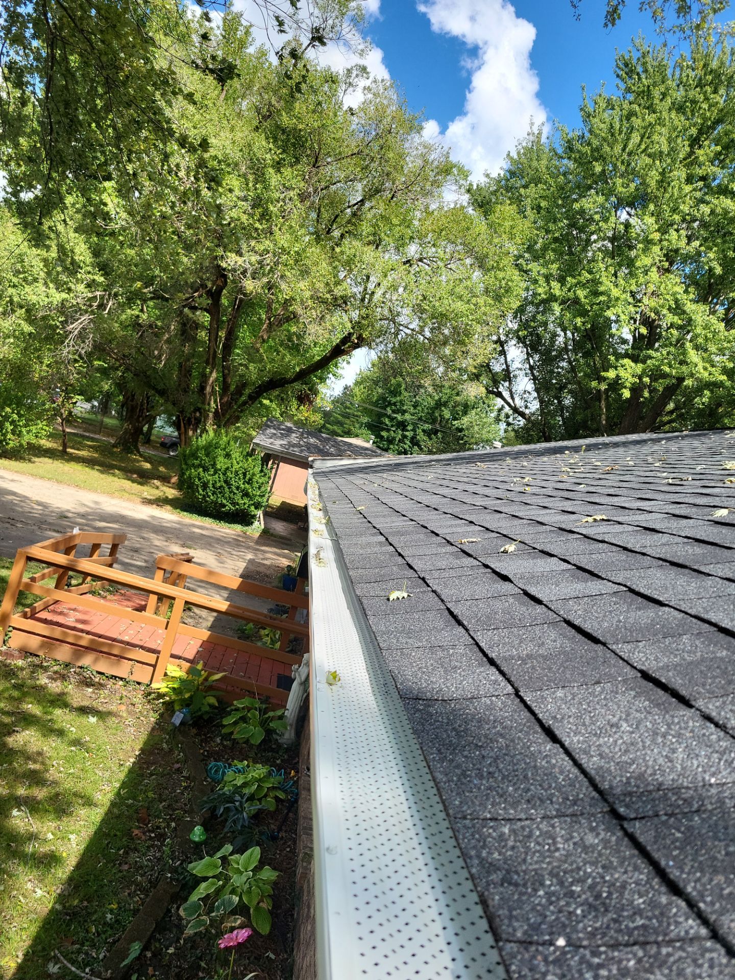 Residential Roofing + Gutters & Gutter Guards Install  by Titan Commercial & Residential Roofing 