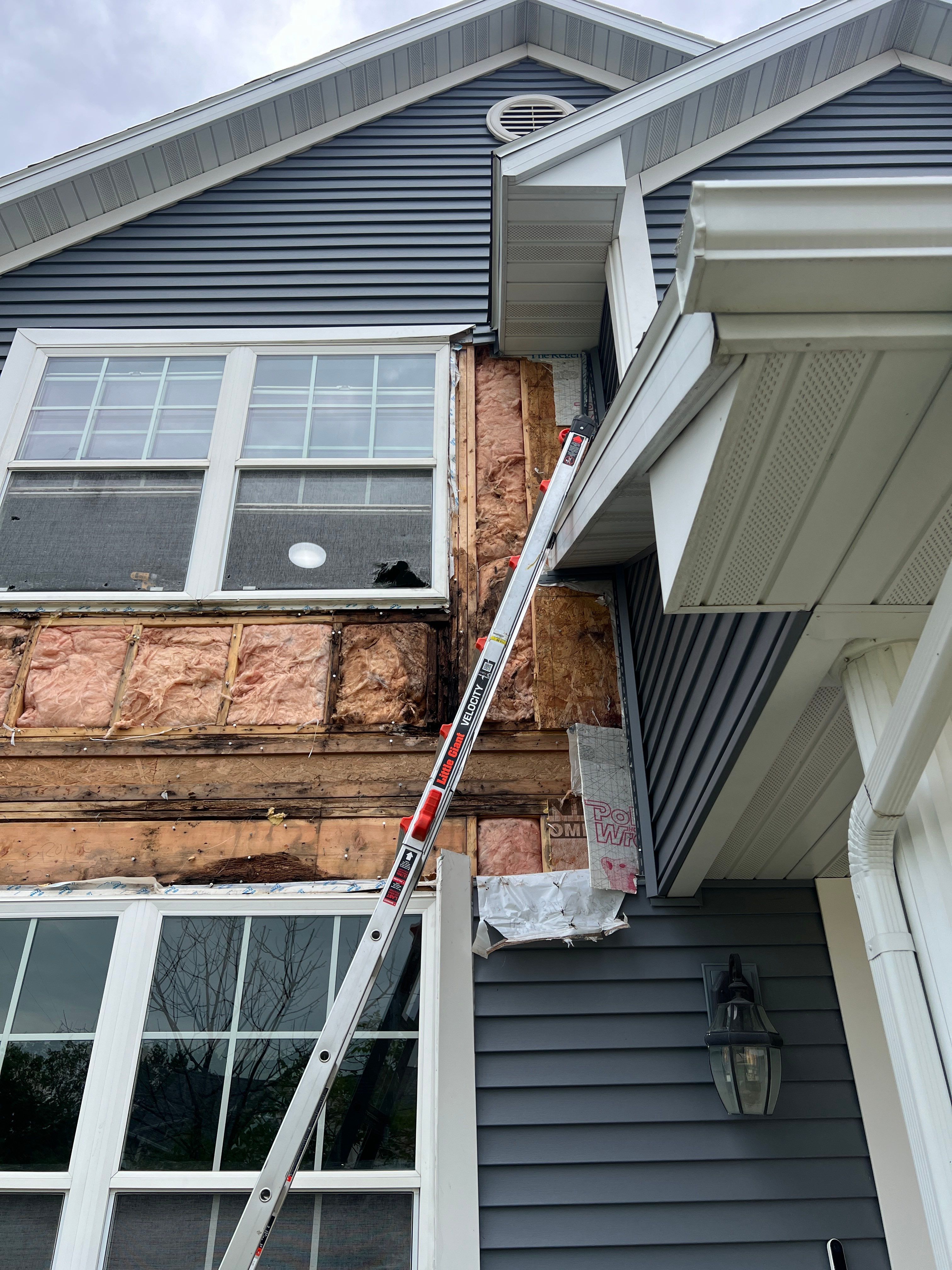 Window and siding replacment using Pella 250 series vinyl window by United Windows and Siding LLC
