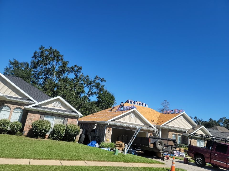 Residential Roofing Installation using Roof Replacement by American Roofing & Construction LLC