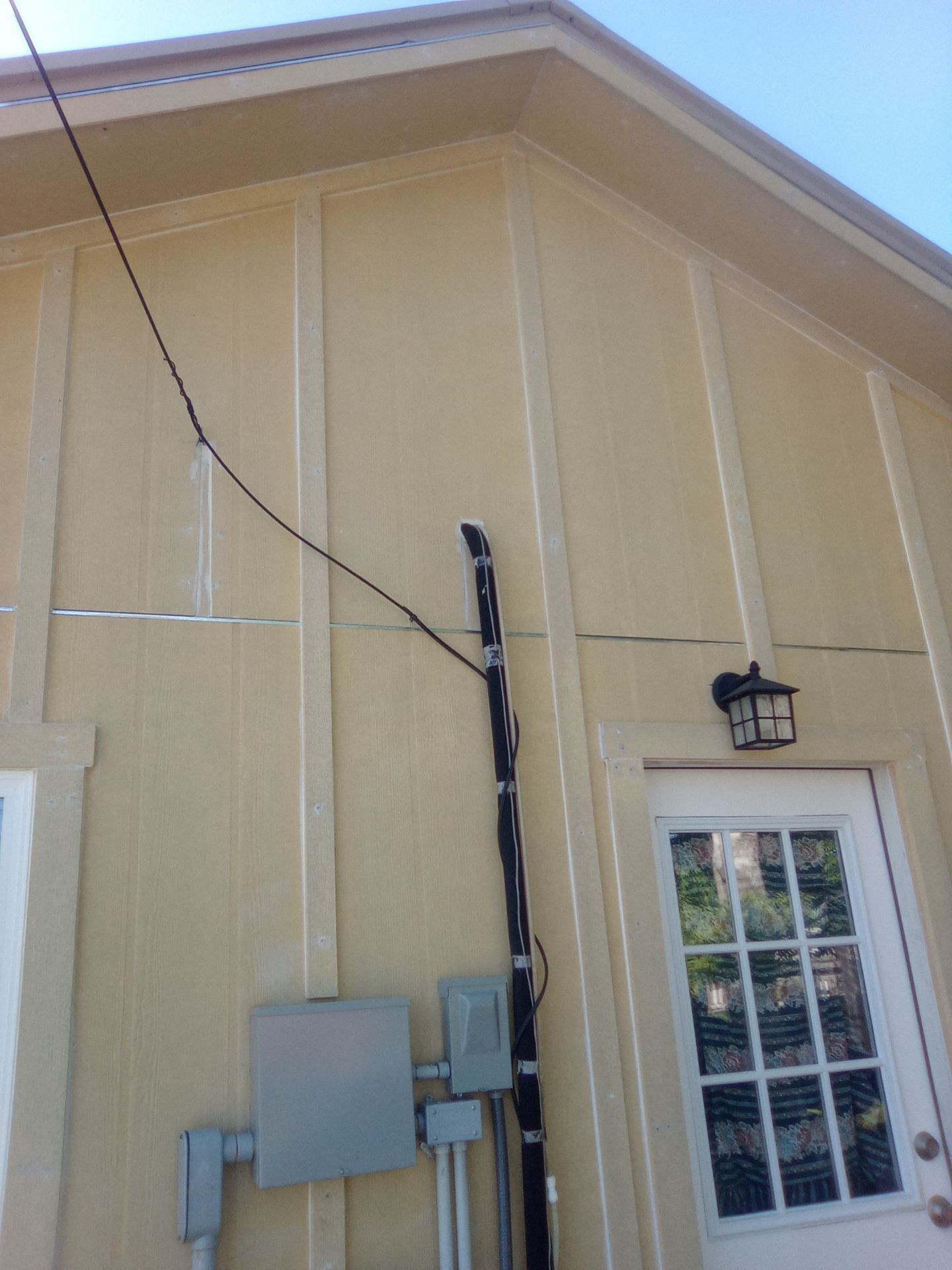 Vinyl to Hardie by Bayfront Roofing and Construction