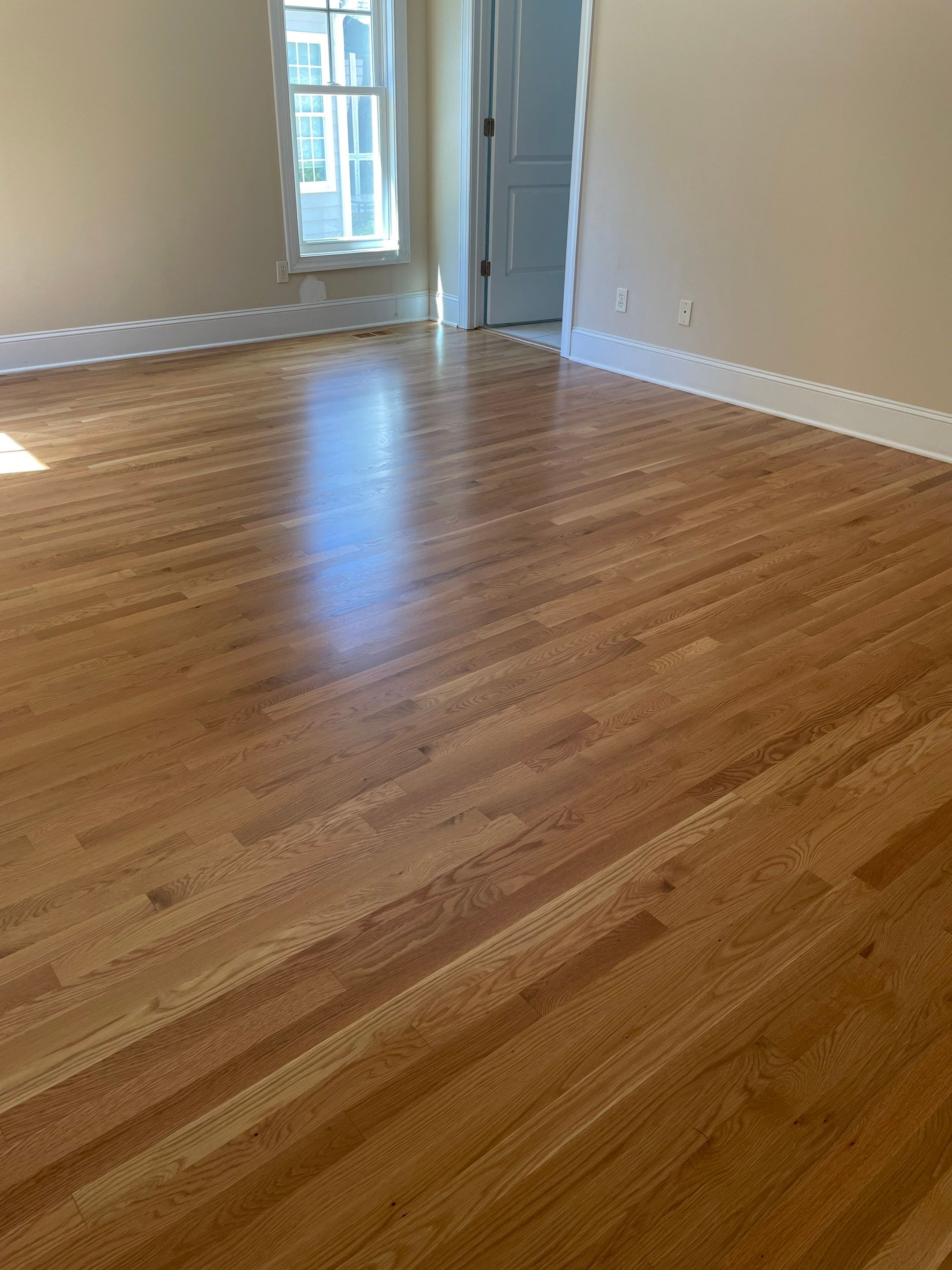 Simple bedroom installation by Accent Custom Floors