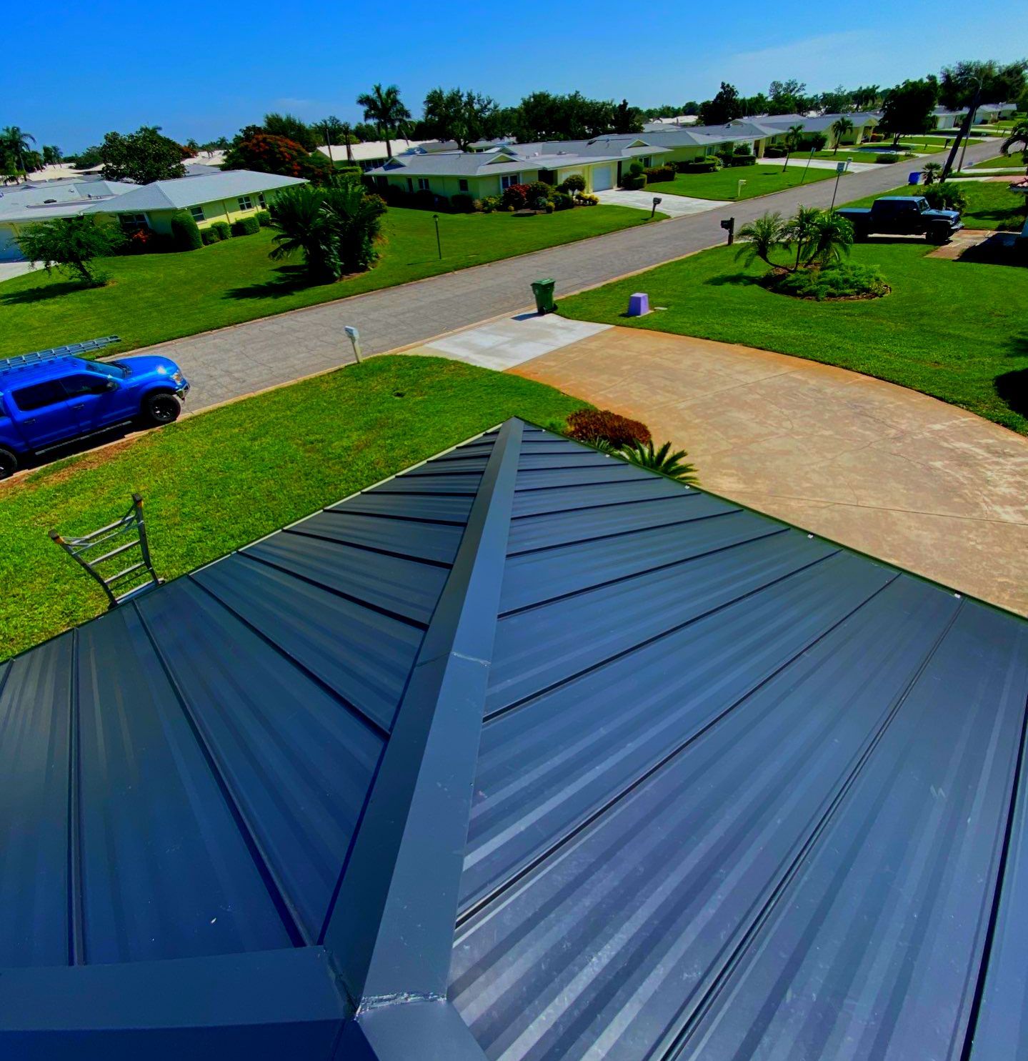 Metal Roofing System by Rooster Roofing, LLC