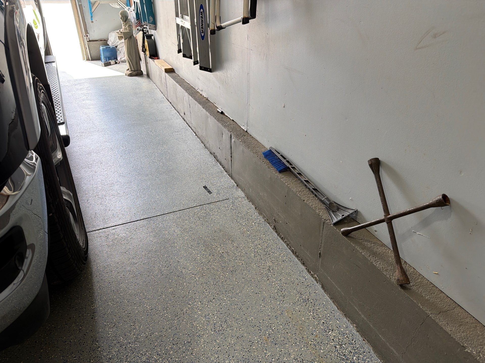 Residential Garage Floor Coating in Sioux Falls by Select Painting, Coatings & Garage Cabinets