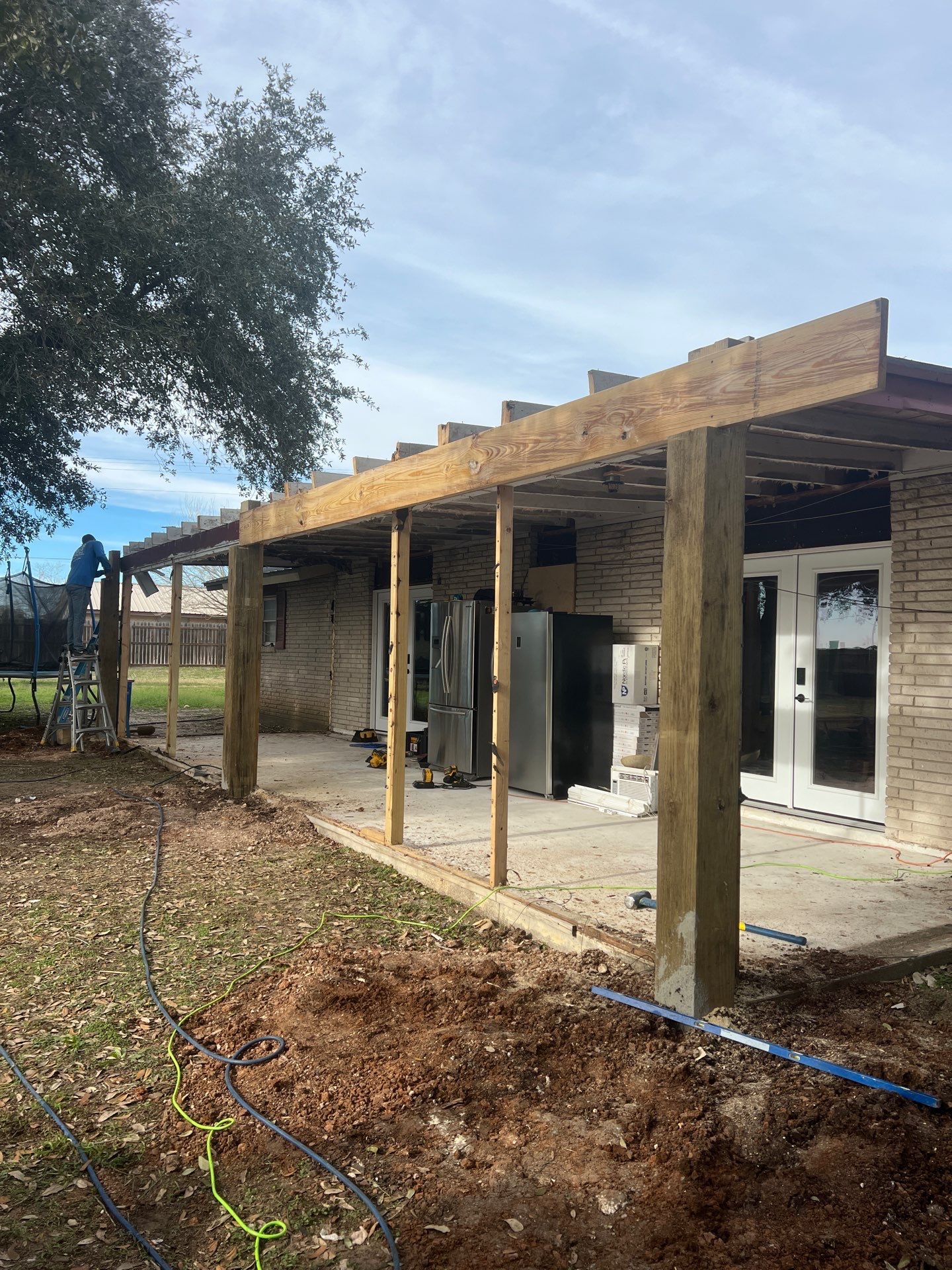 Patio? We got you Covered! by Bayfront Roofing and Construction