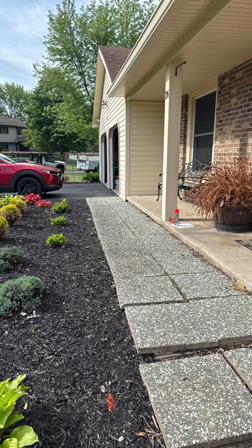 Bluestone stamped concrete patio  by NG Masonry & Construction LLC