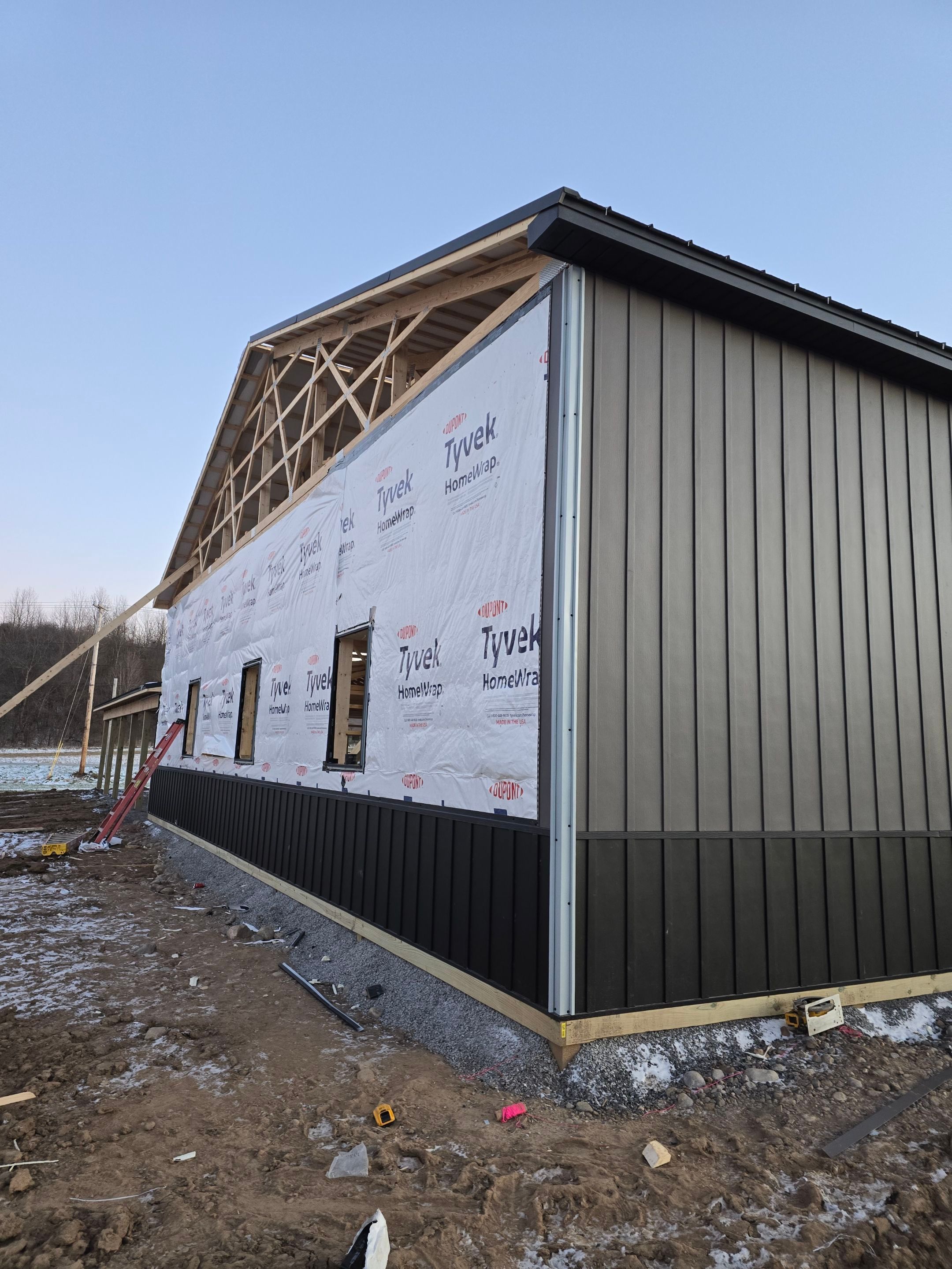 Barndominium  using Textured Board & Batton by Horst Custom Homes 