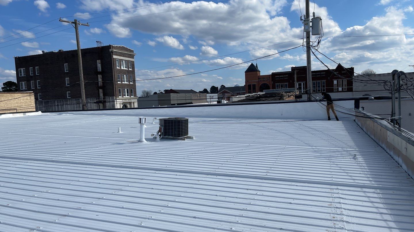 Commercial Metal Restoration System using Aldocoat Coatings by Hostetler Roofing
