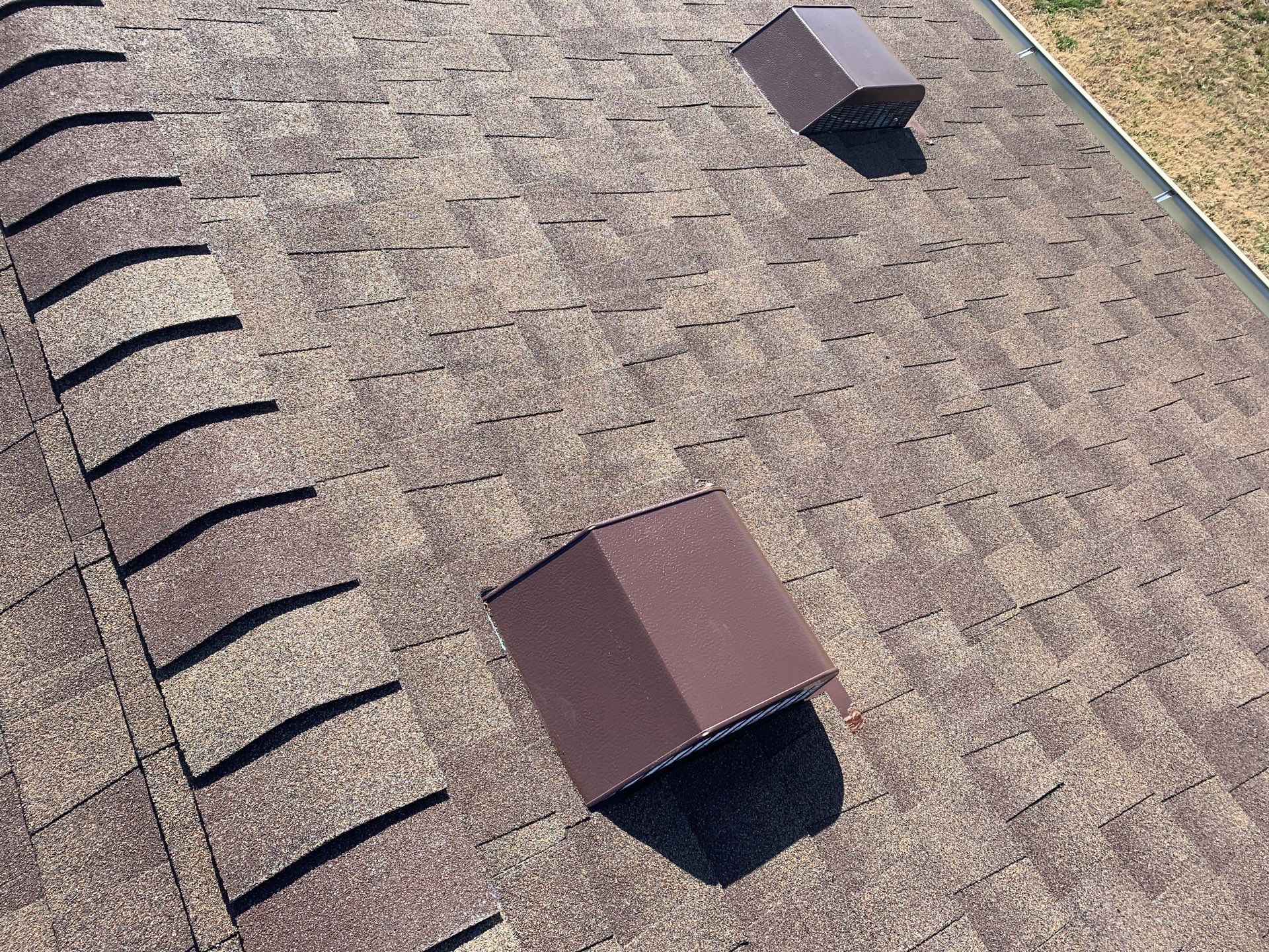roof and vent replacement in Tuttle by McCann's Roofing and Construction