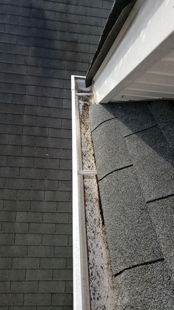 gutters and Driveway by Power Wash Masters LLC