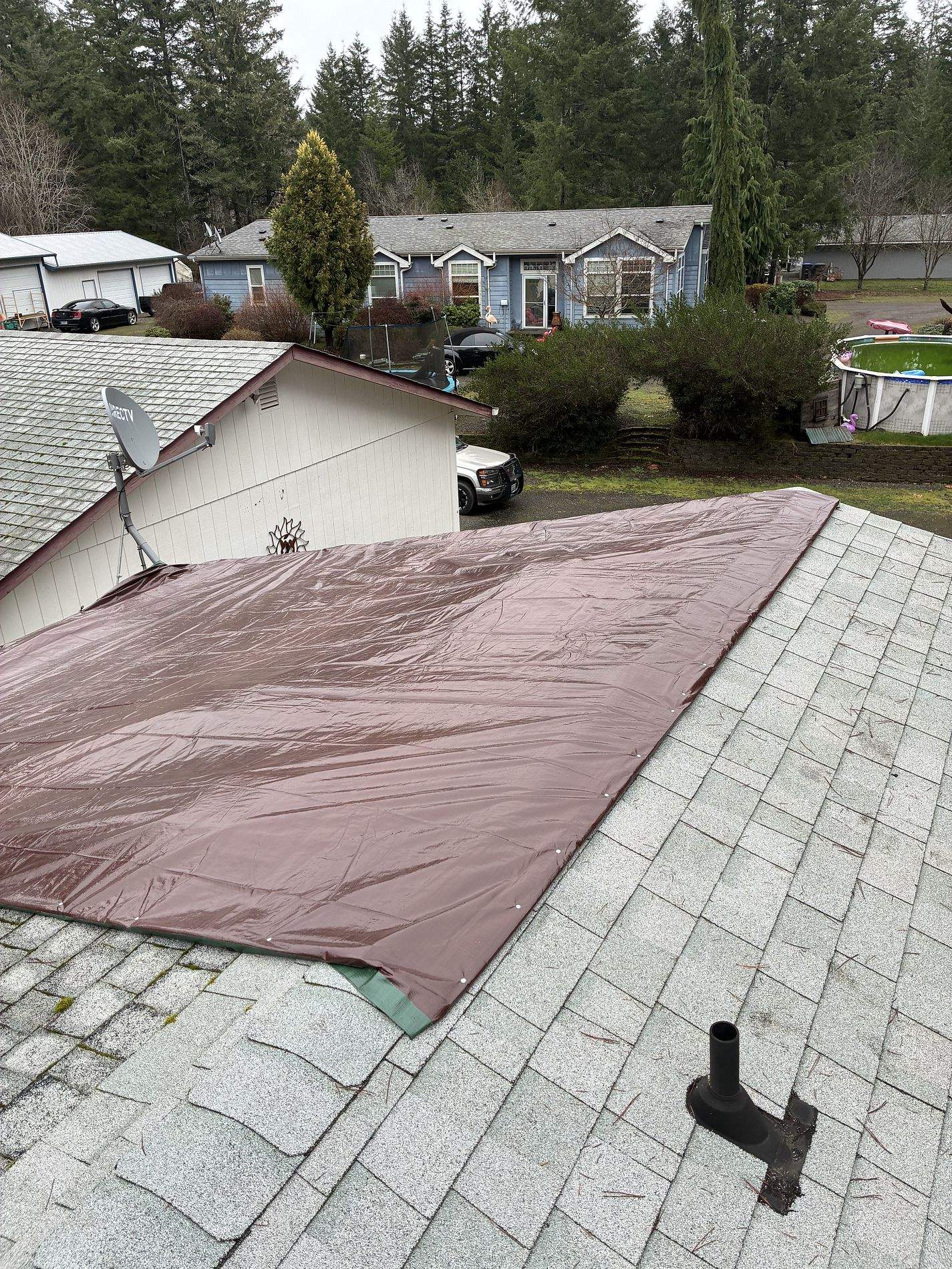 Residential Roof Repair in Progress in Grapeview, WA by Hanley Construction