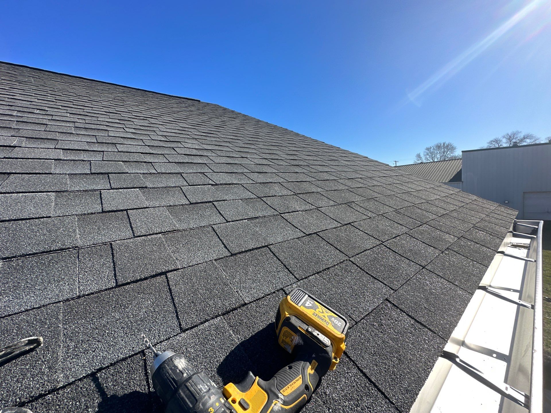 Residential Roofing Installation using GAF Timberline HDZ Charcoal by Nitro Roofing and Construction