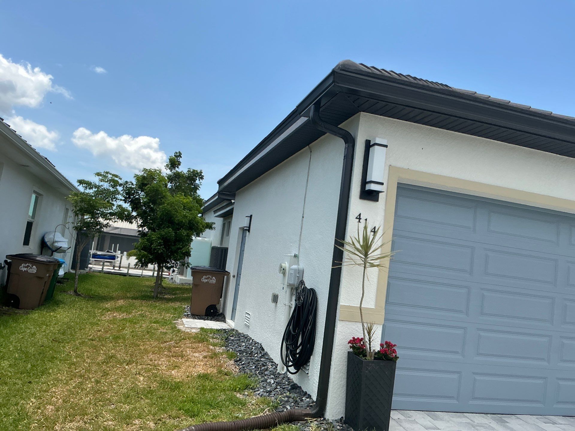 Dark Bronze 7-Inch Gutter Installation in Cape Coral FL by Gutter Professors
