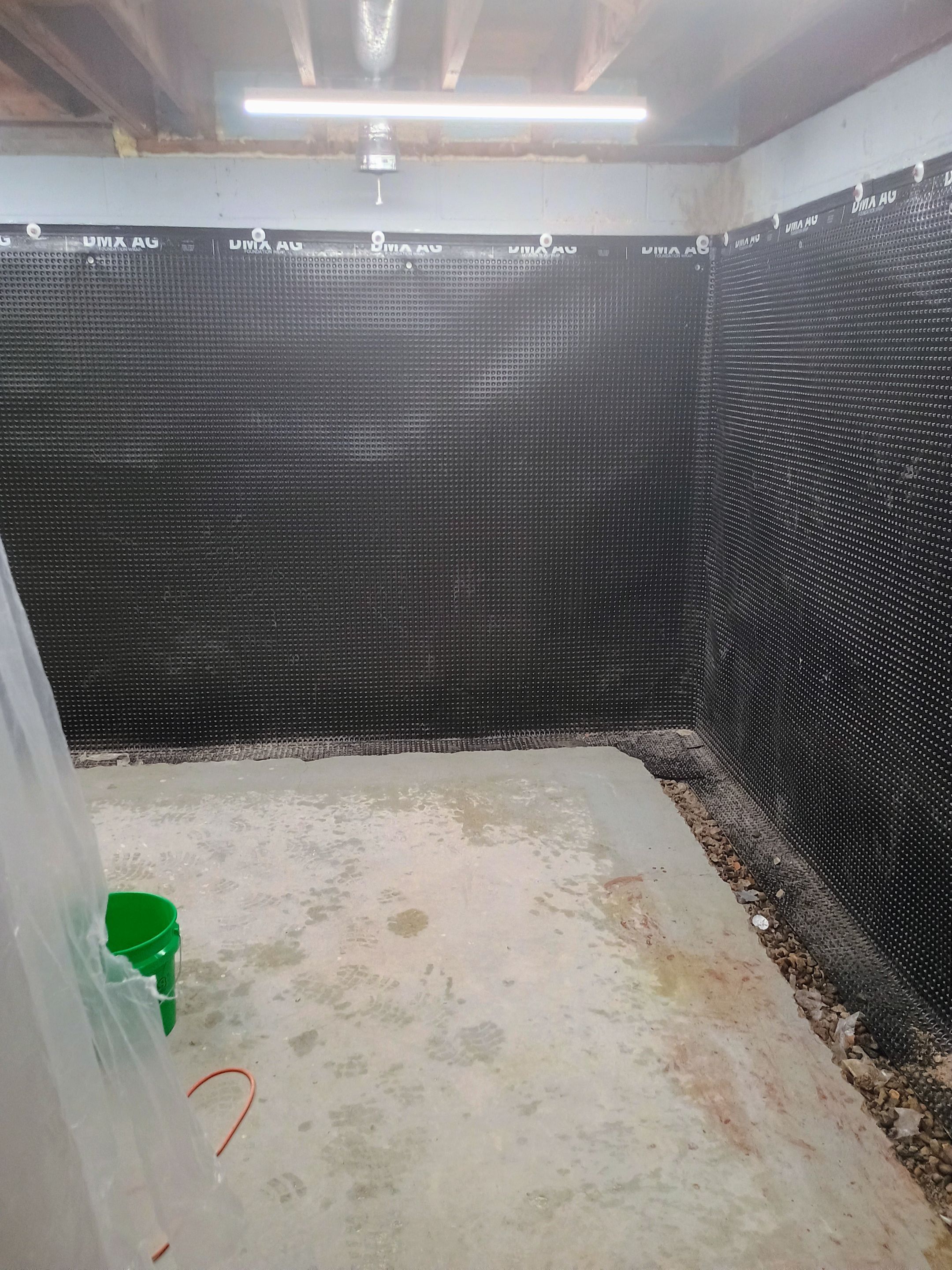 Depressurizing Denny's Basement Wall by Waterproofing Northeast