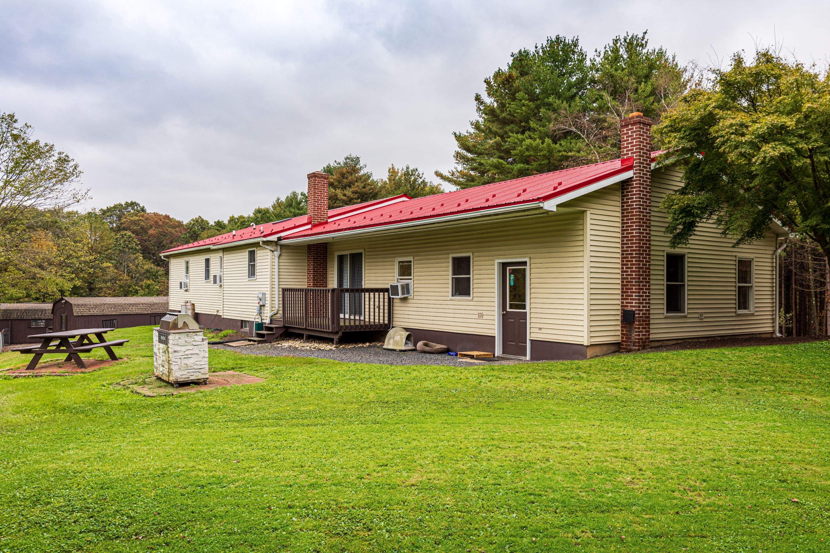 Metal Roof-scarlet red by Esh Builders