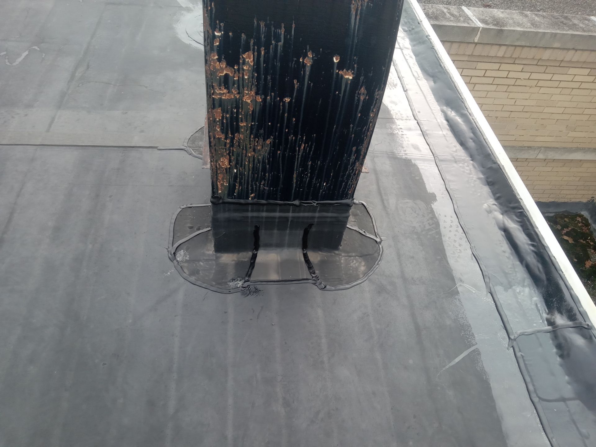 Commercial Roofing using Roof Replacement by Absolute Roofing and Construction