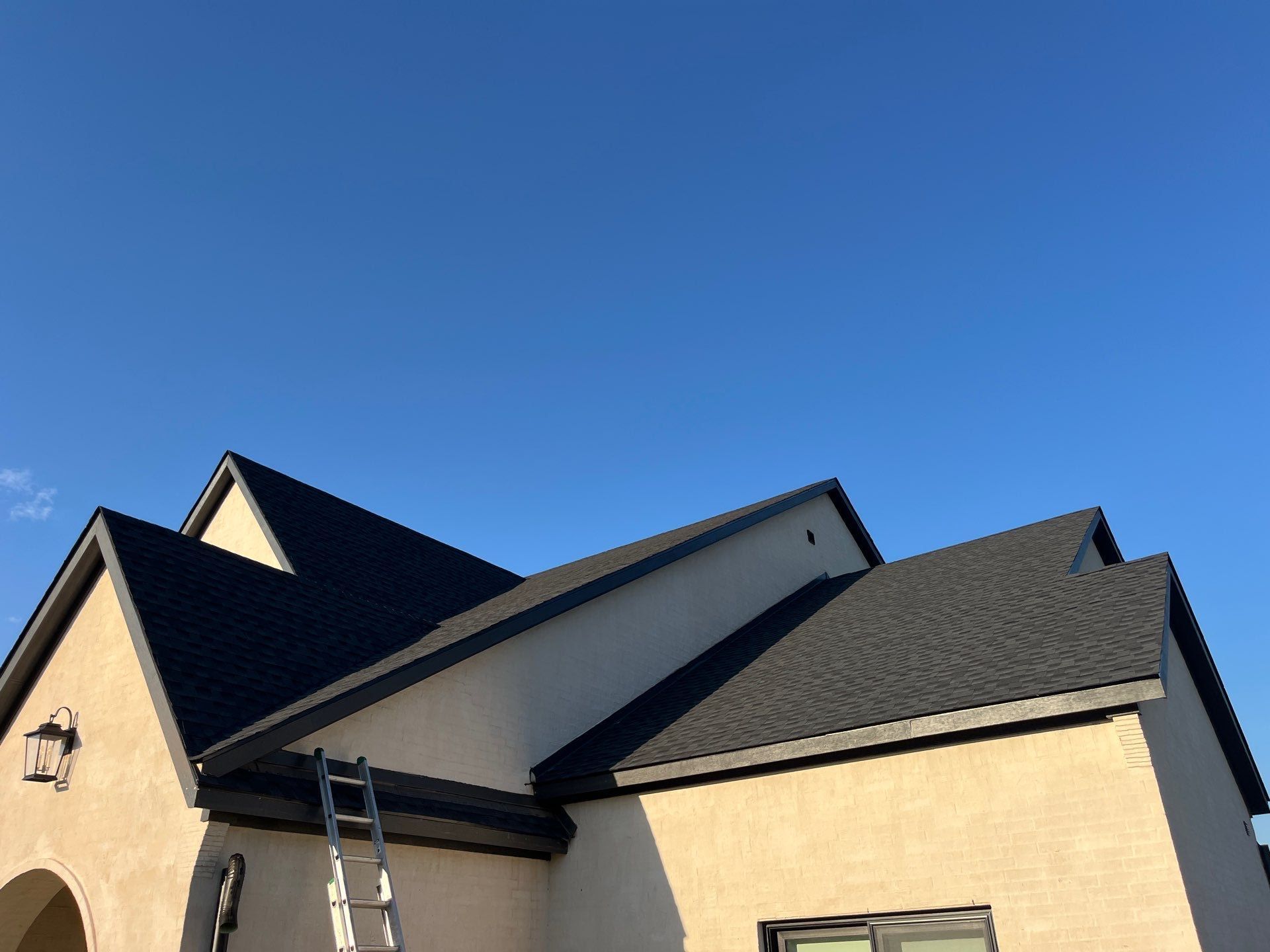 GAF-Charcoal with White Brick  by Tejas Roofworks + Restoration