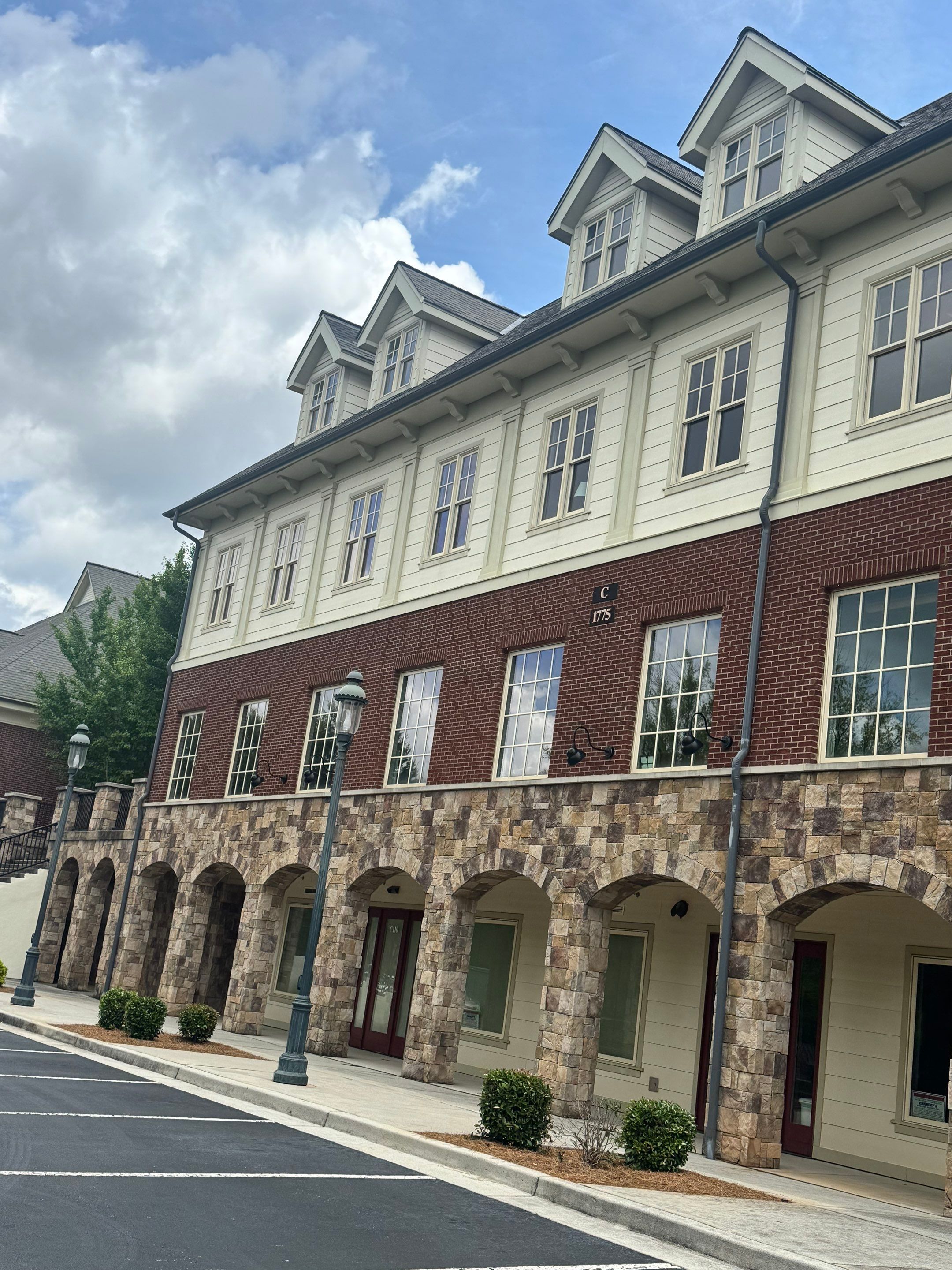 Commercial Exterior & Stairwell Painting – Corner Market by PGP Surface Solutions, LLC