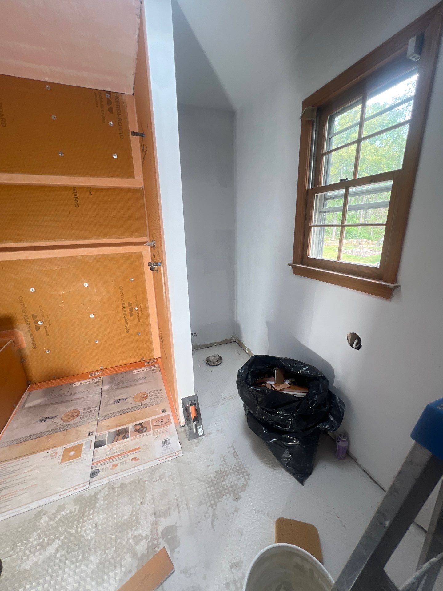 Modern Bathroom Remodeling Featuring Marble Tiles and Custom Cabinetry in Smyrna by Swift Home Renovations