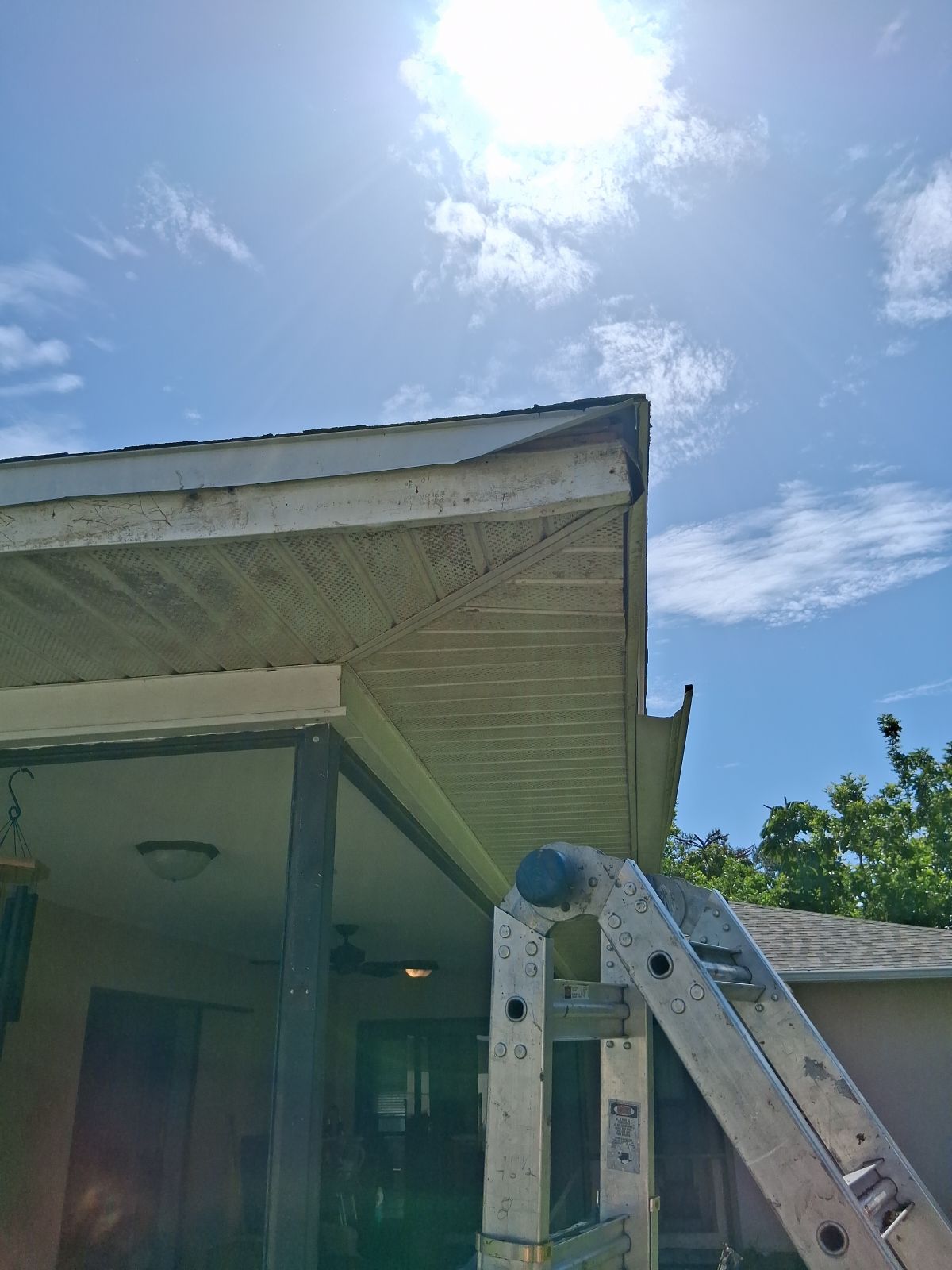 Replace gutter using White Down Spouts in Cape Coral FL by Gutter Professors
