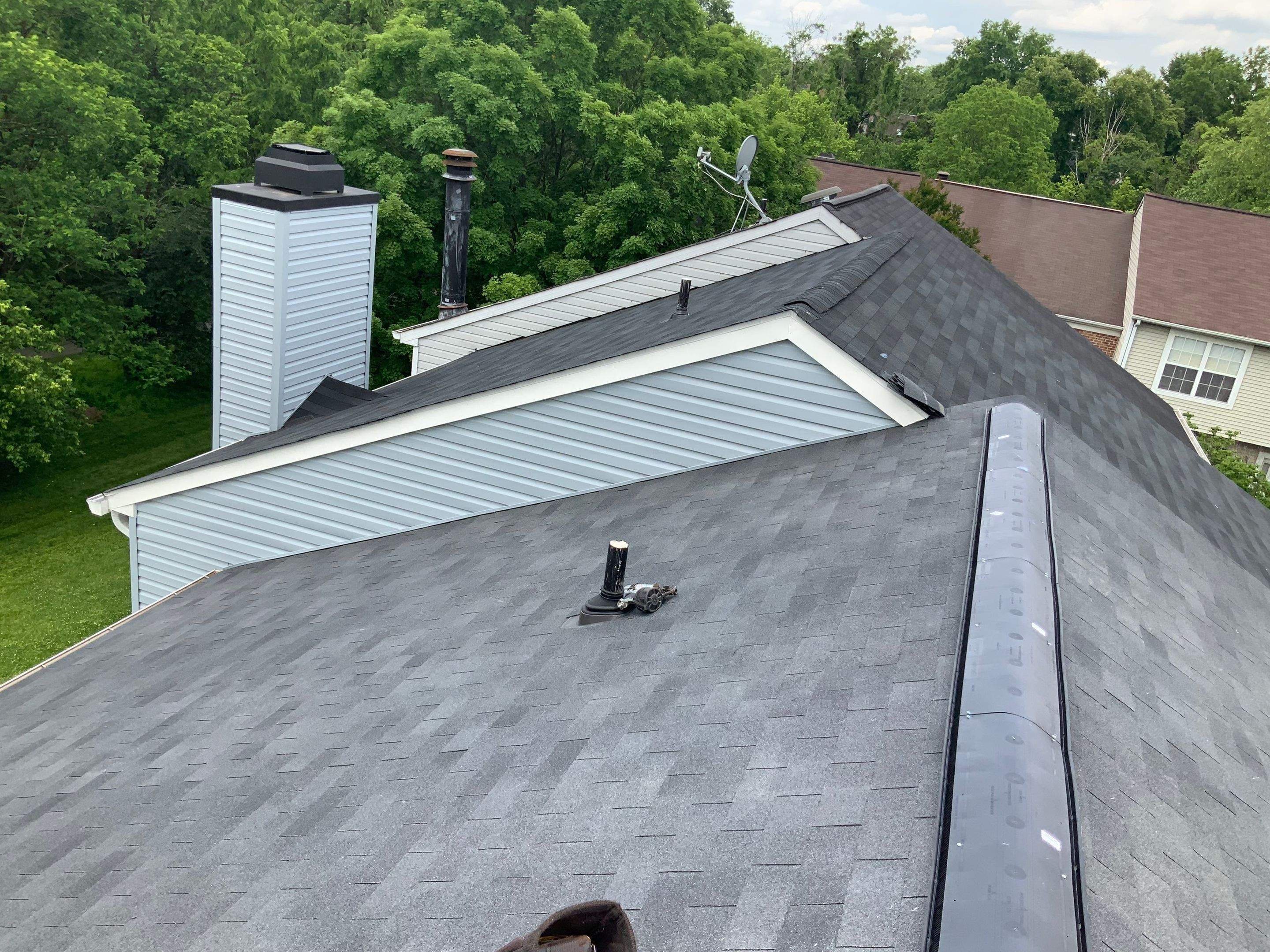 Residential Roofing Installation using XT-25 Color Moire Black by Alpha Design Services