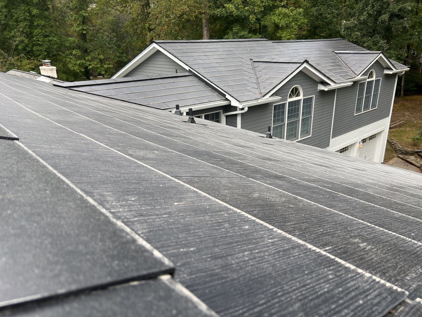 Tesla Solar Roof Replacement using Tesla Solar Roof V3 Tiles by American Home Contractors