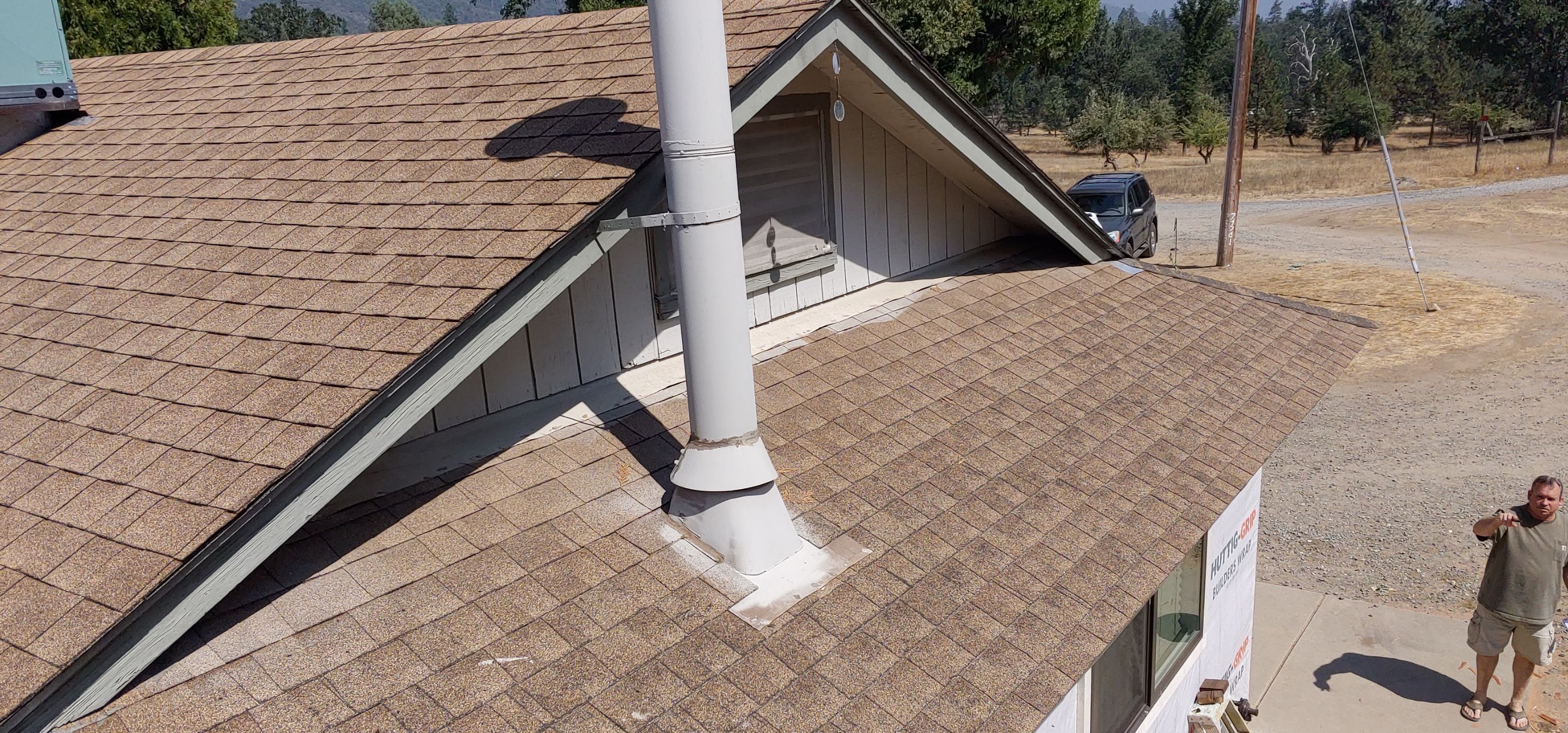 Residential Roofing Installation using Standing seam metal roofing system by Straight Edge Roofing Inc