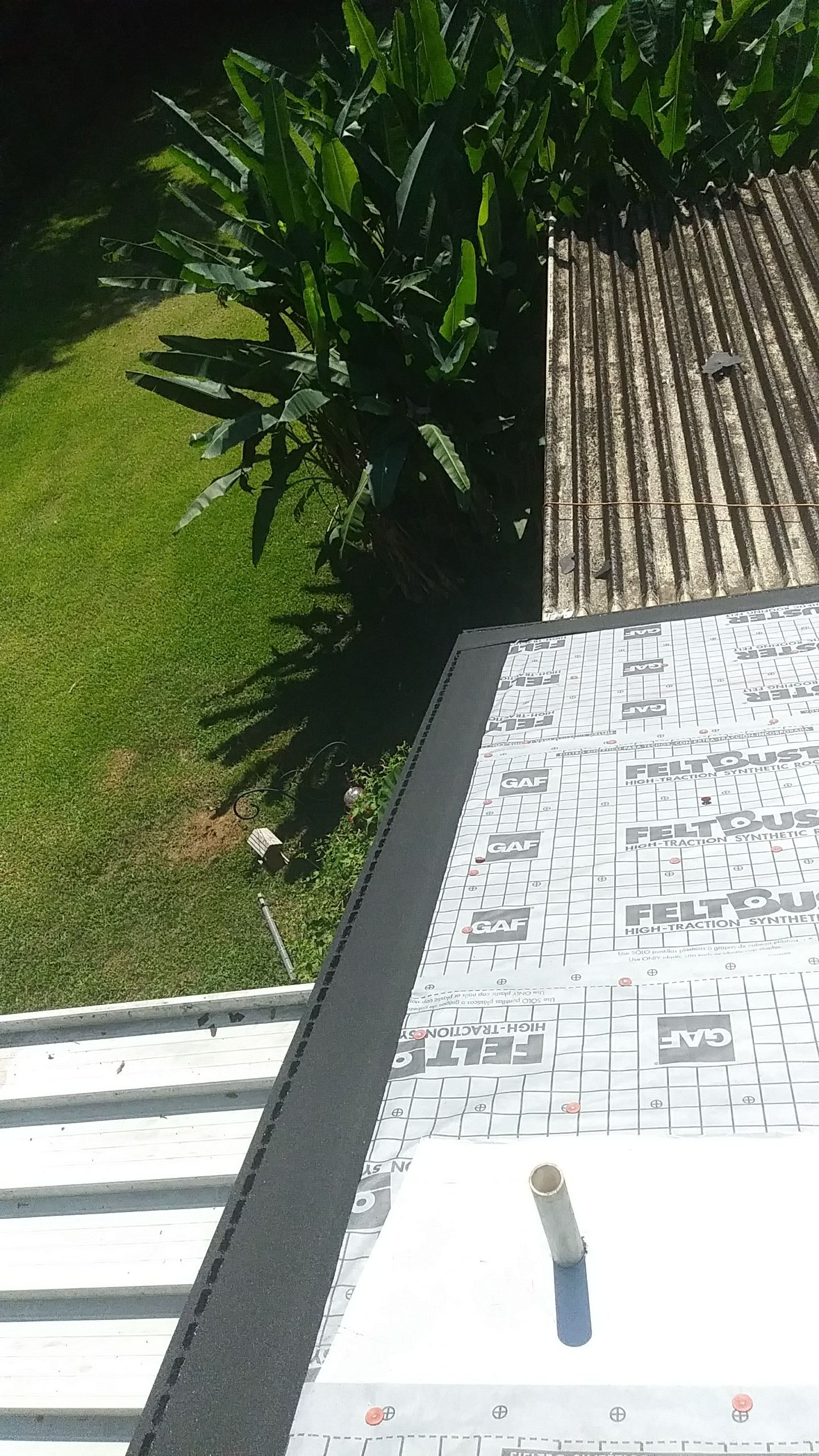 Residential Roofing Installation using Roof Replacement by American Roofing & Construction LLC