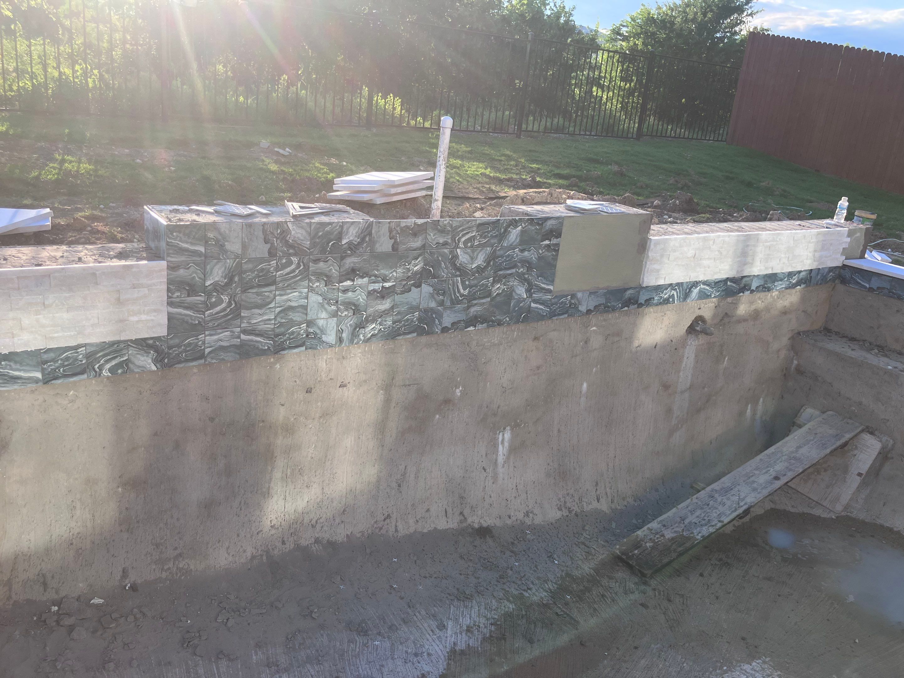 Sleek Geometric Pool with Crisp White Decking by Pinnacle Pools and Spas - DFW