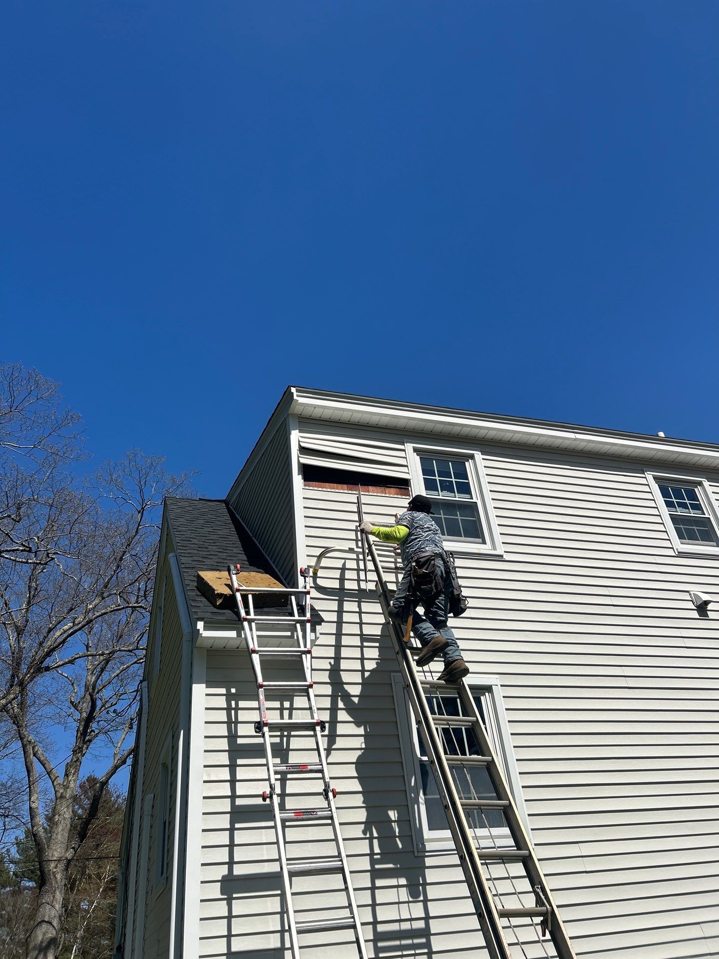 Vinyl Siding Repair with Spot Replacement by Mighty Dog Roofing of Greater Middlesex County