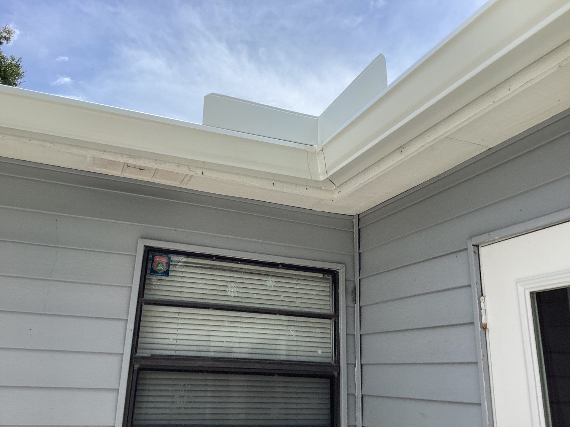Aluminum Seamless Gutters using Splash Guard in Cape Coral FL by Gutter Professors