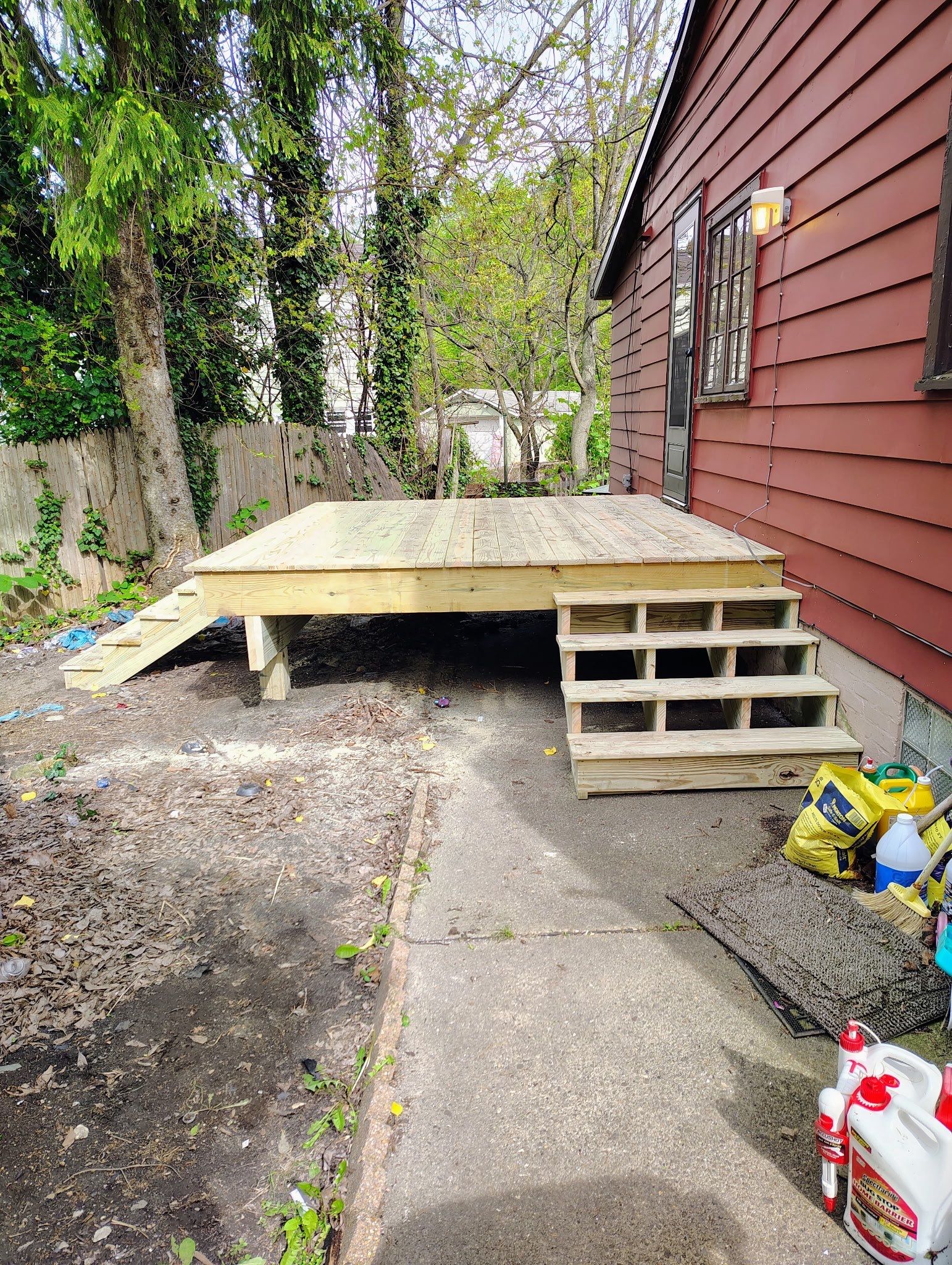 Roof sunspace deck  by Cousins Roofing Siding & Decks