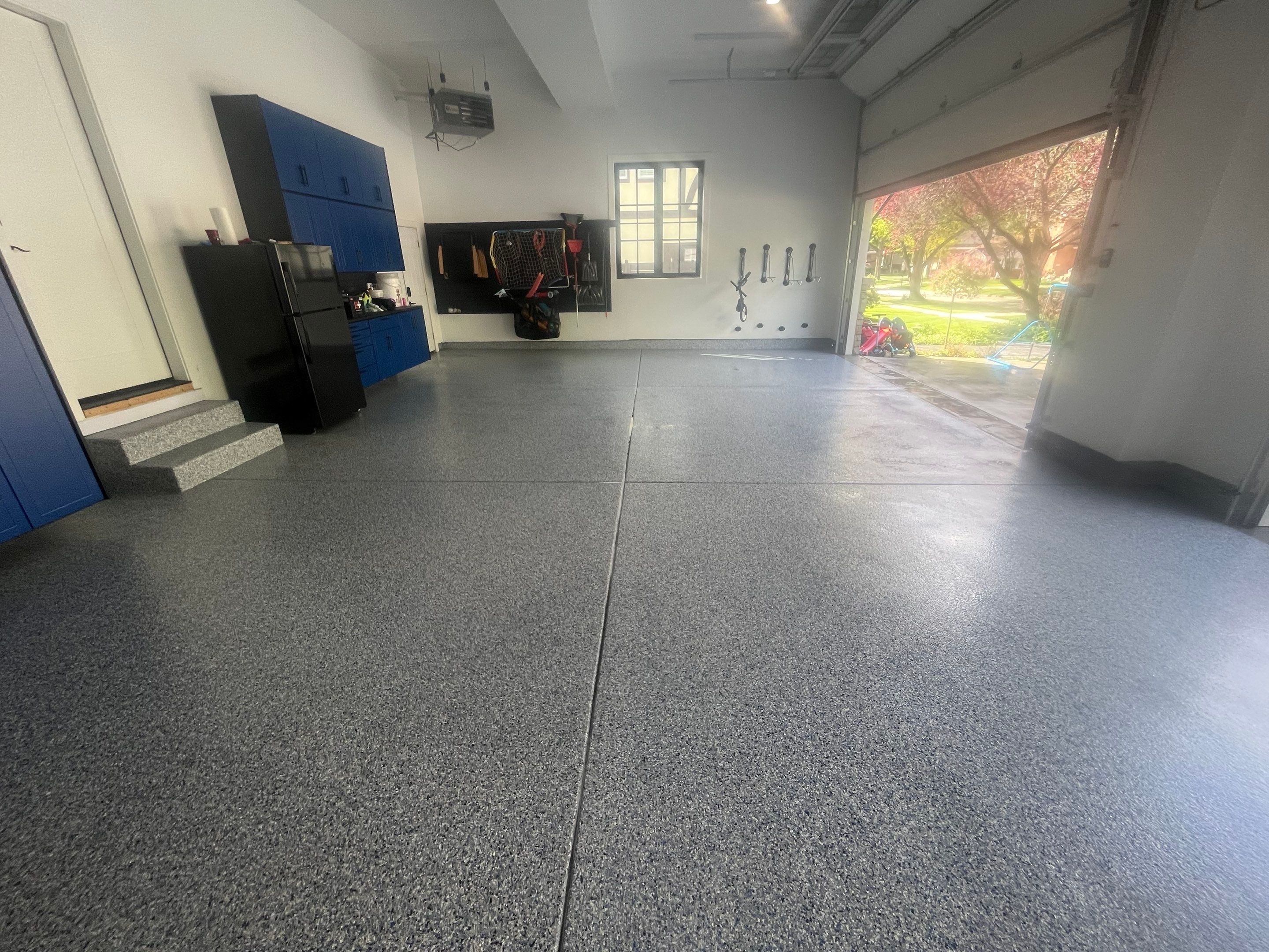 Residential Garage Floor Pressure Washing by Northern Power Washing LLC.