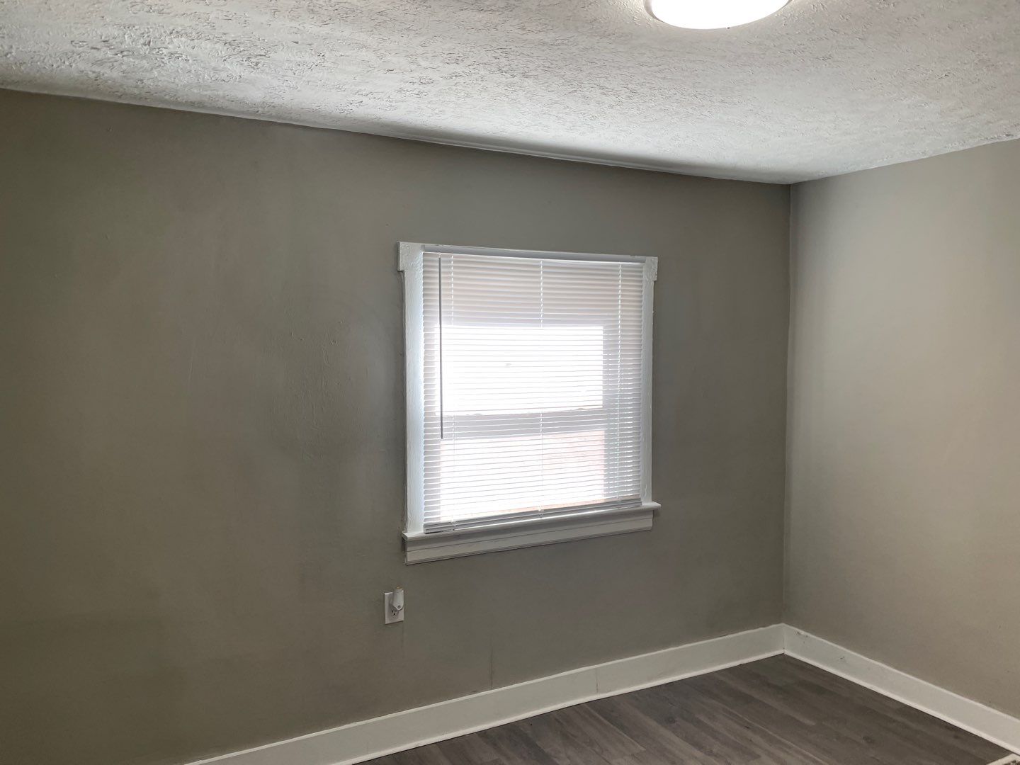 Rental Property Restoration, siding, flooring, gutters, landscaping by Storm Contracting 