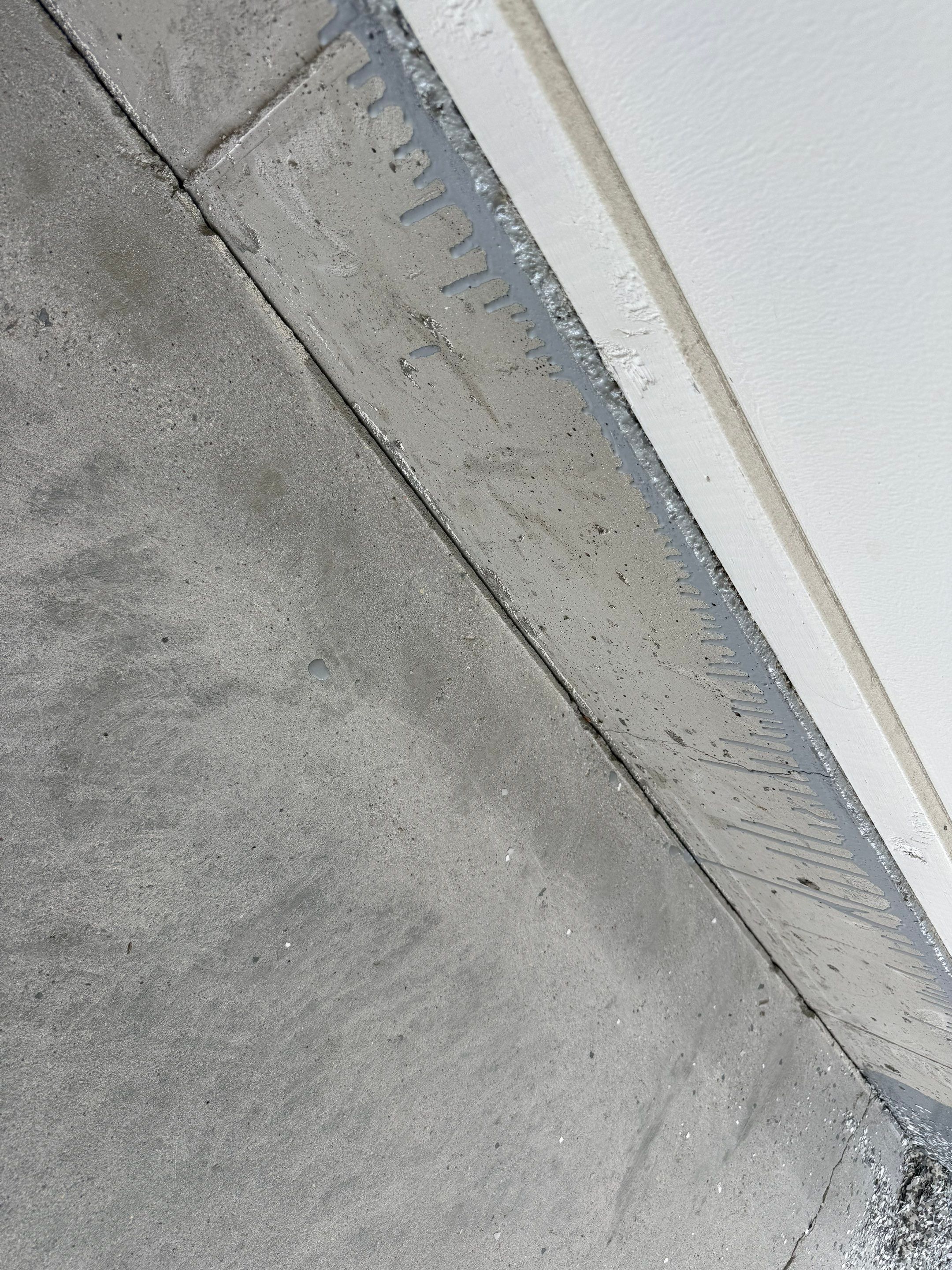 Gravel Flake Garage Floor Coating in Yankton by Select Painting, Coatings & Garage Cabinets