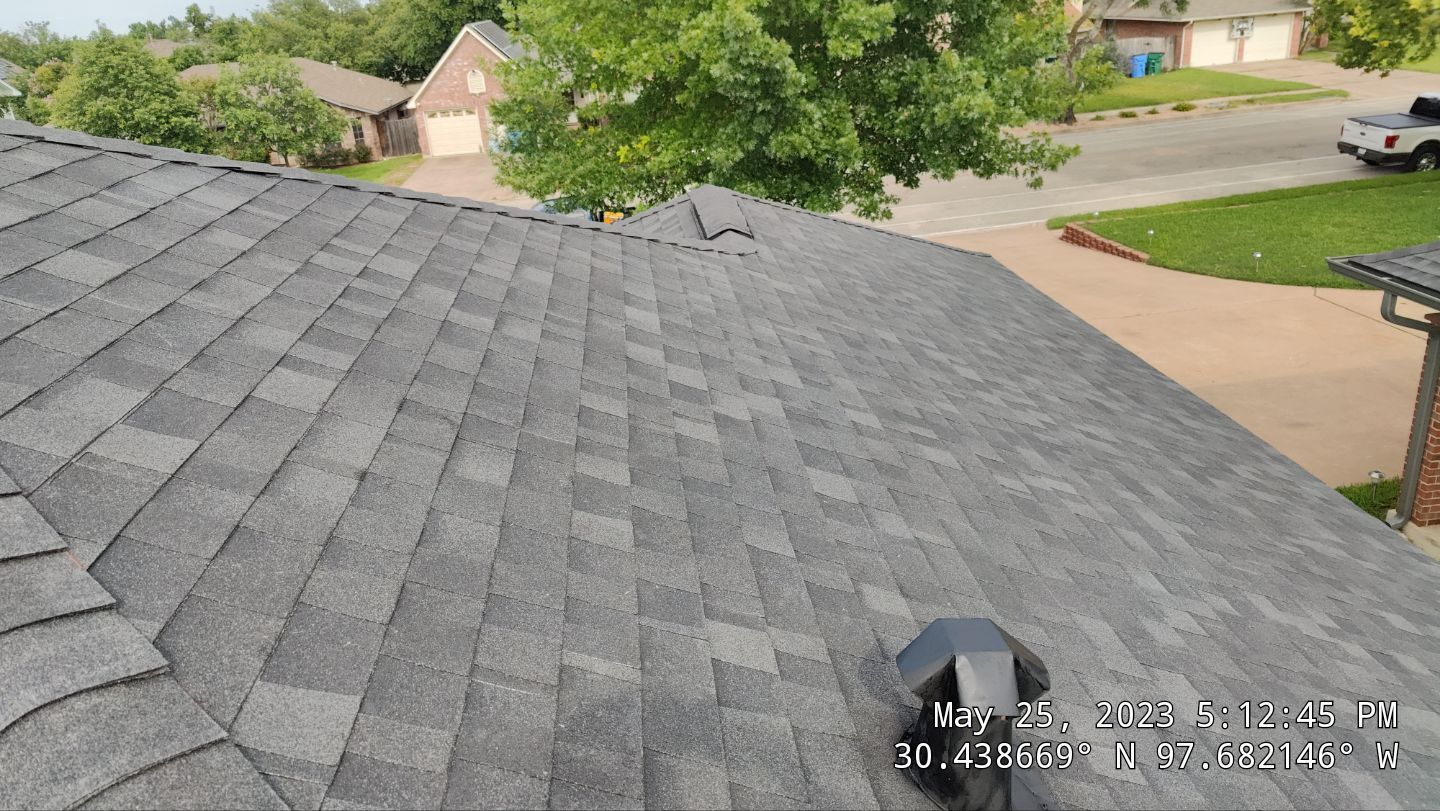 Residential Roofing Installation using Owens Corning Oakridge Onyx Black by DeZign Roofing & Exteriors