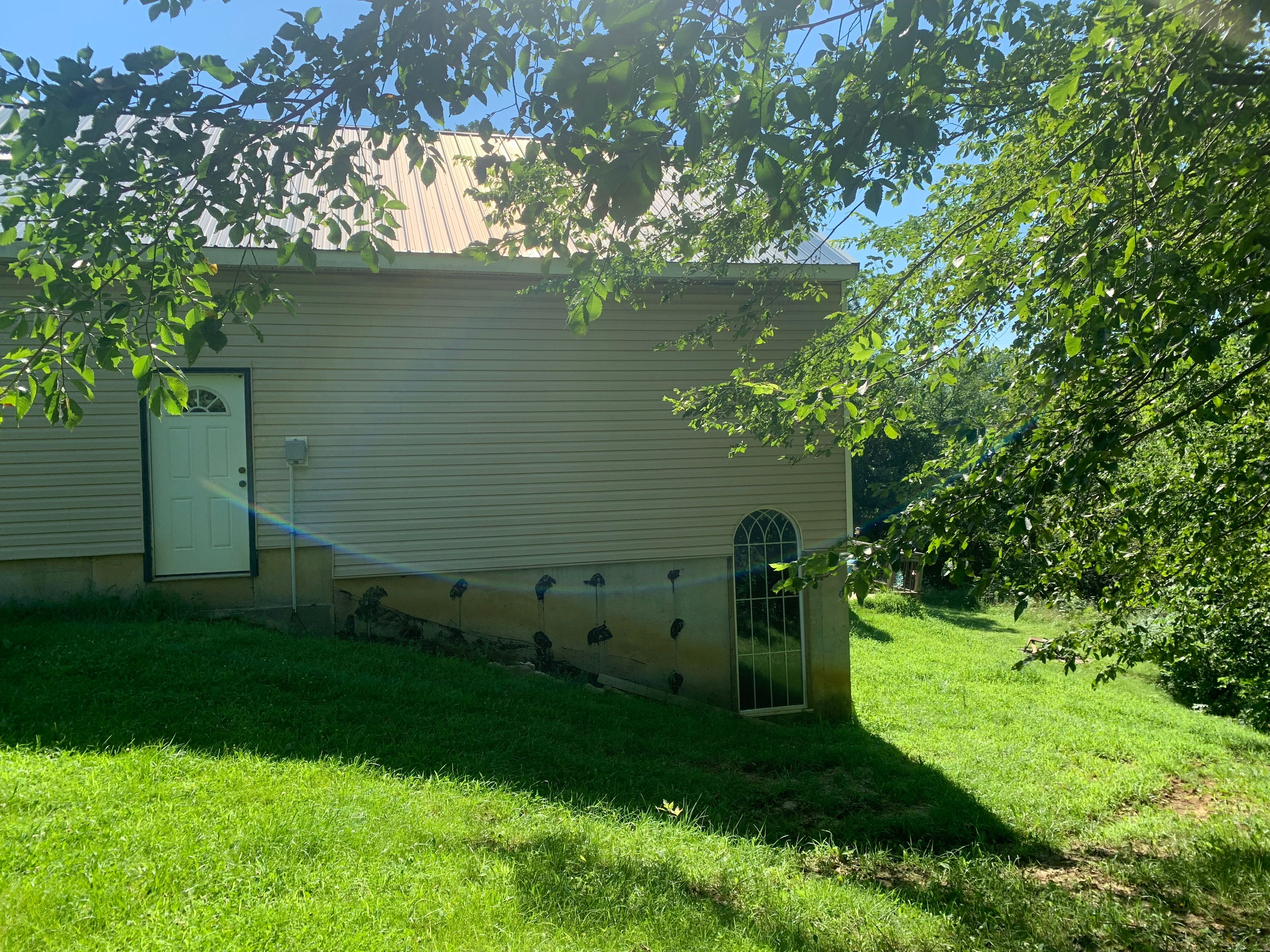 Contemporary house Siding Installation using Mastic Premium Vinyl siding  by EEC  Windows, Siding & Roofing 