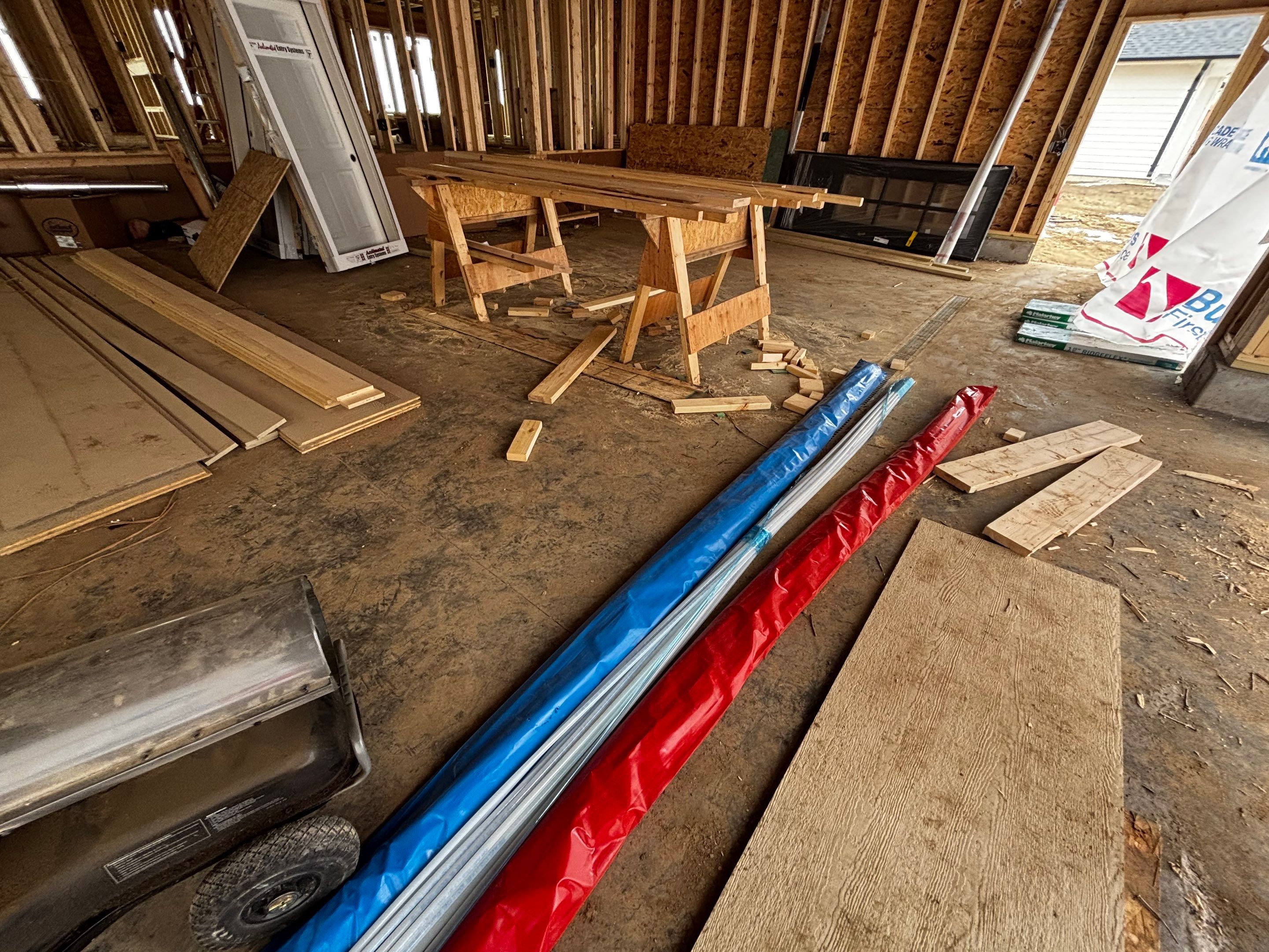 Multi-Car Garage Epoxy Floor Coating and Concrete Finishing in Sioux Falls by Select Painting, Coatings & Garage Cabinets