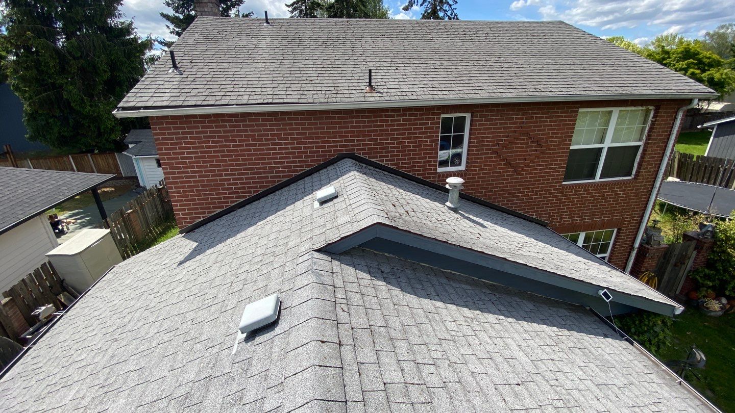 Estate Gray Shingles by Reimagine Roofing
