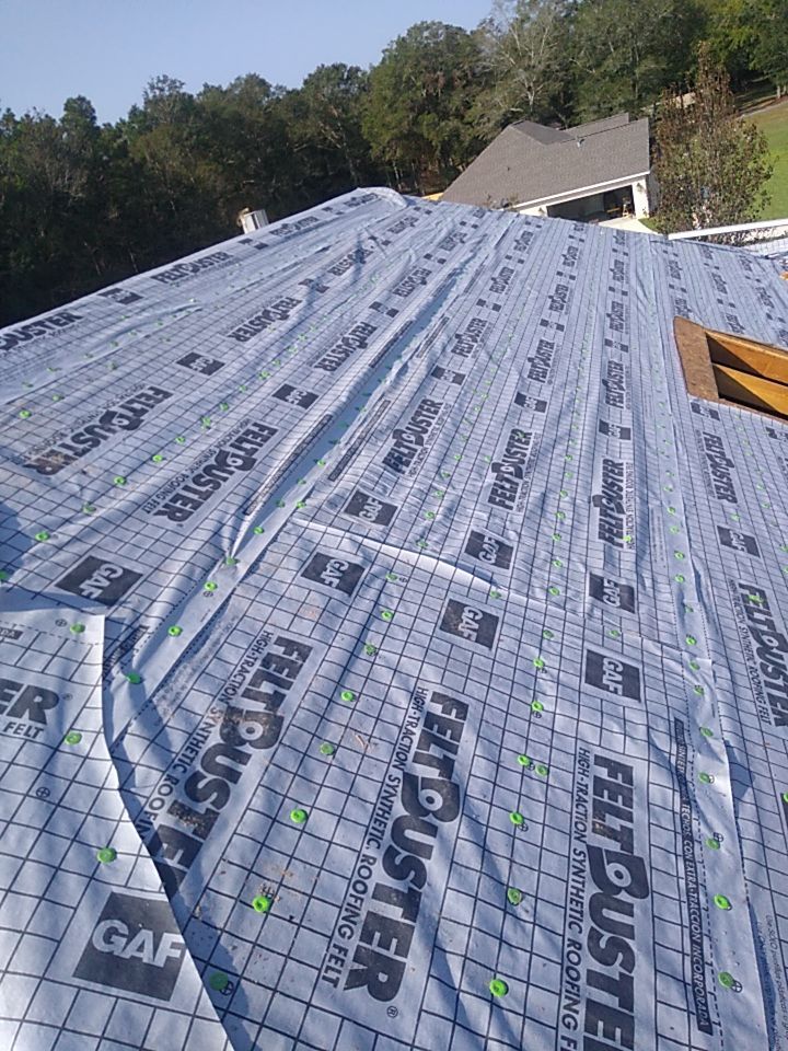 Residential Roofing Installation using Roof Replacement by American Roofing & Construction LLC