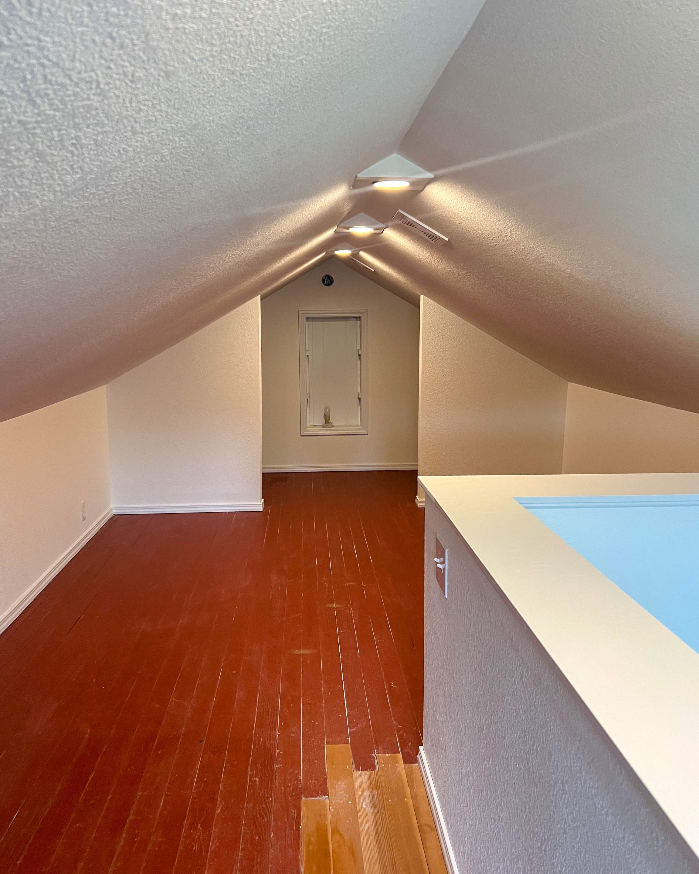 Attic Room Finished with Drywall by Villegas Remodeling, LLC