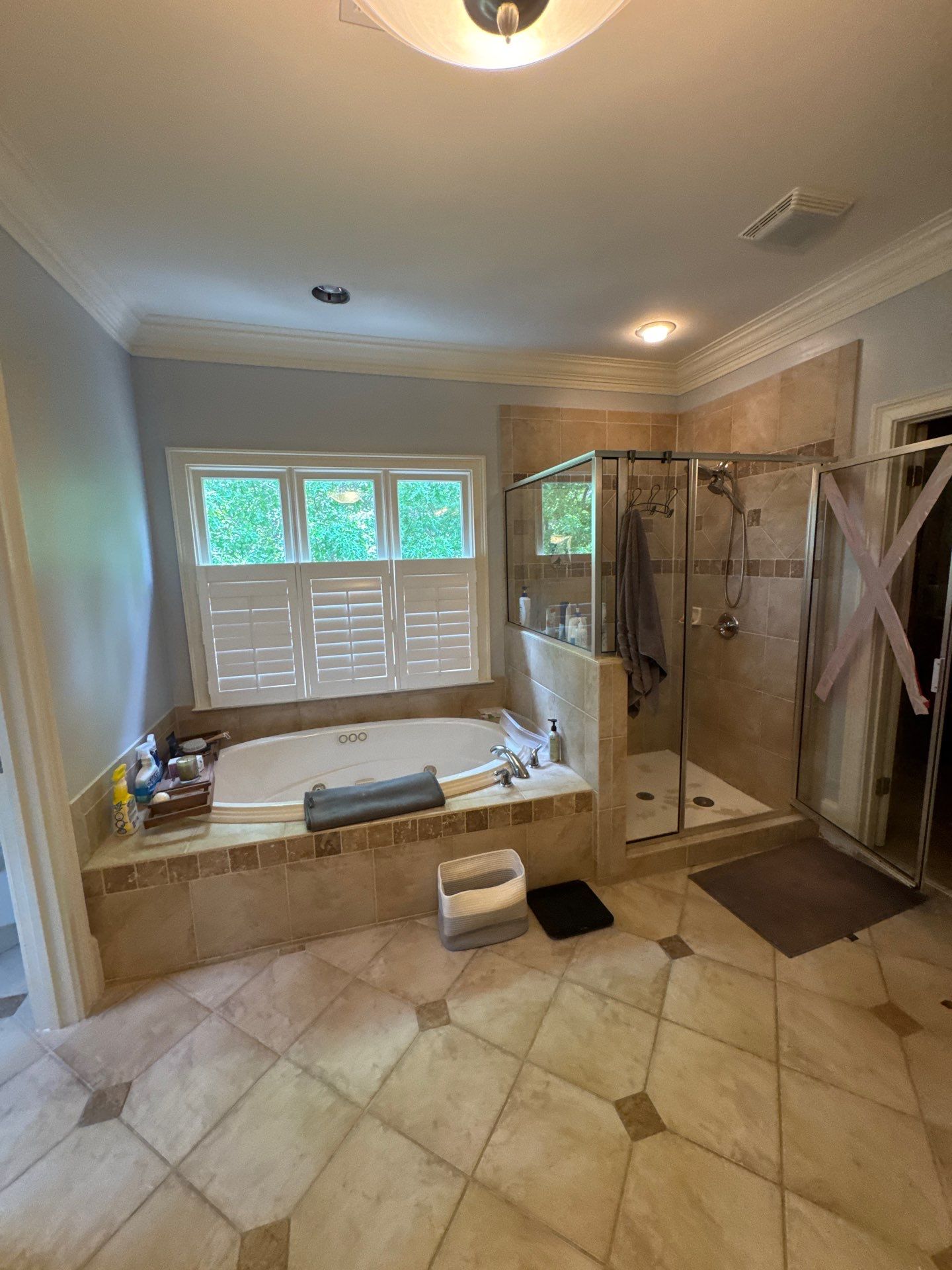 Master bathroom renovation using Free standing tub by Prudencio