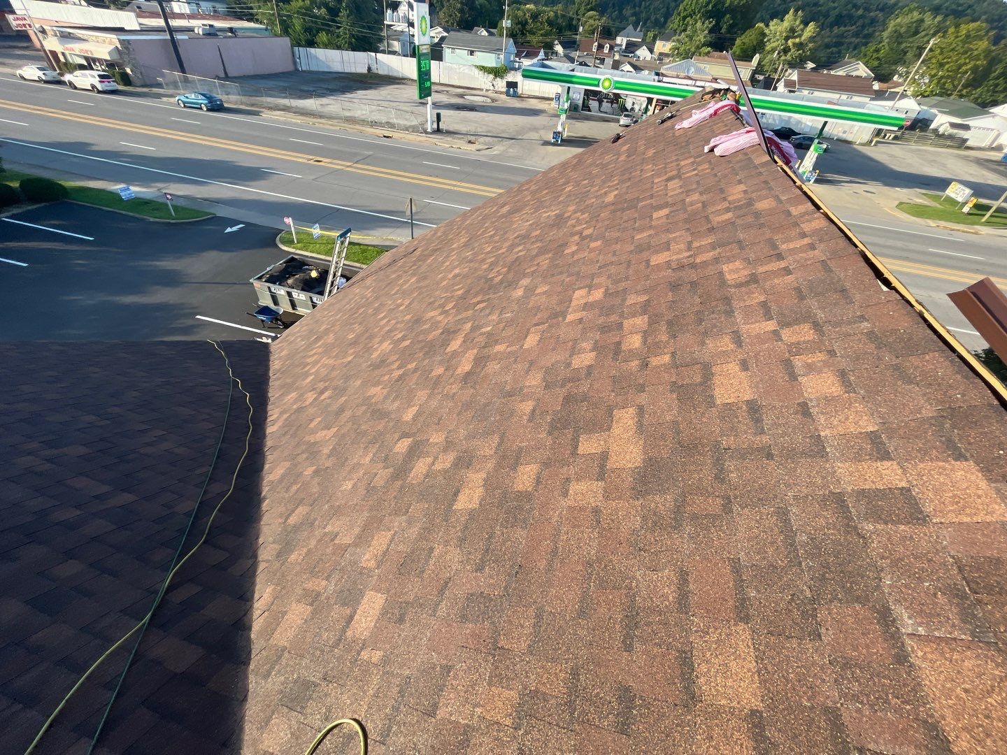 Commercial Roofing Installation using Performance Shingles by Mr. Roofer
