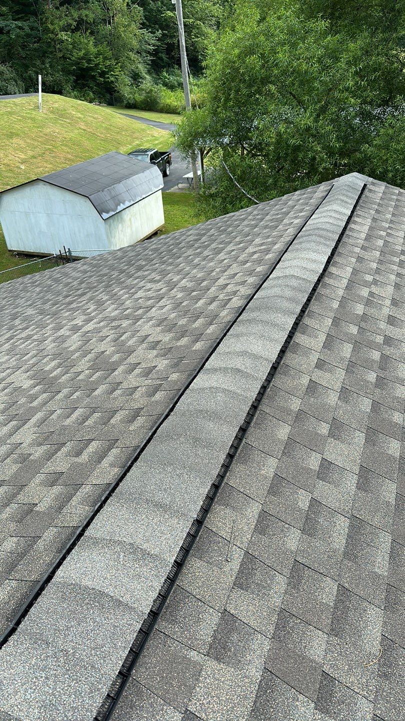 Residential Roofing Installation using Performance Shingles by Mr. Roofer
