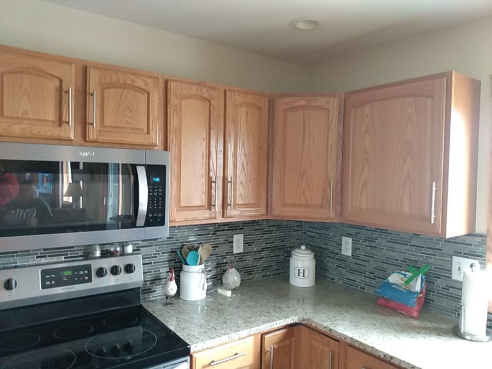 Kitchen cabinet repaint by Cutting edge painting 