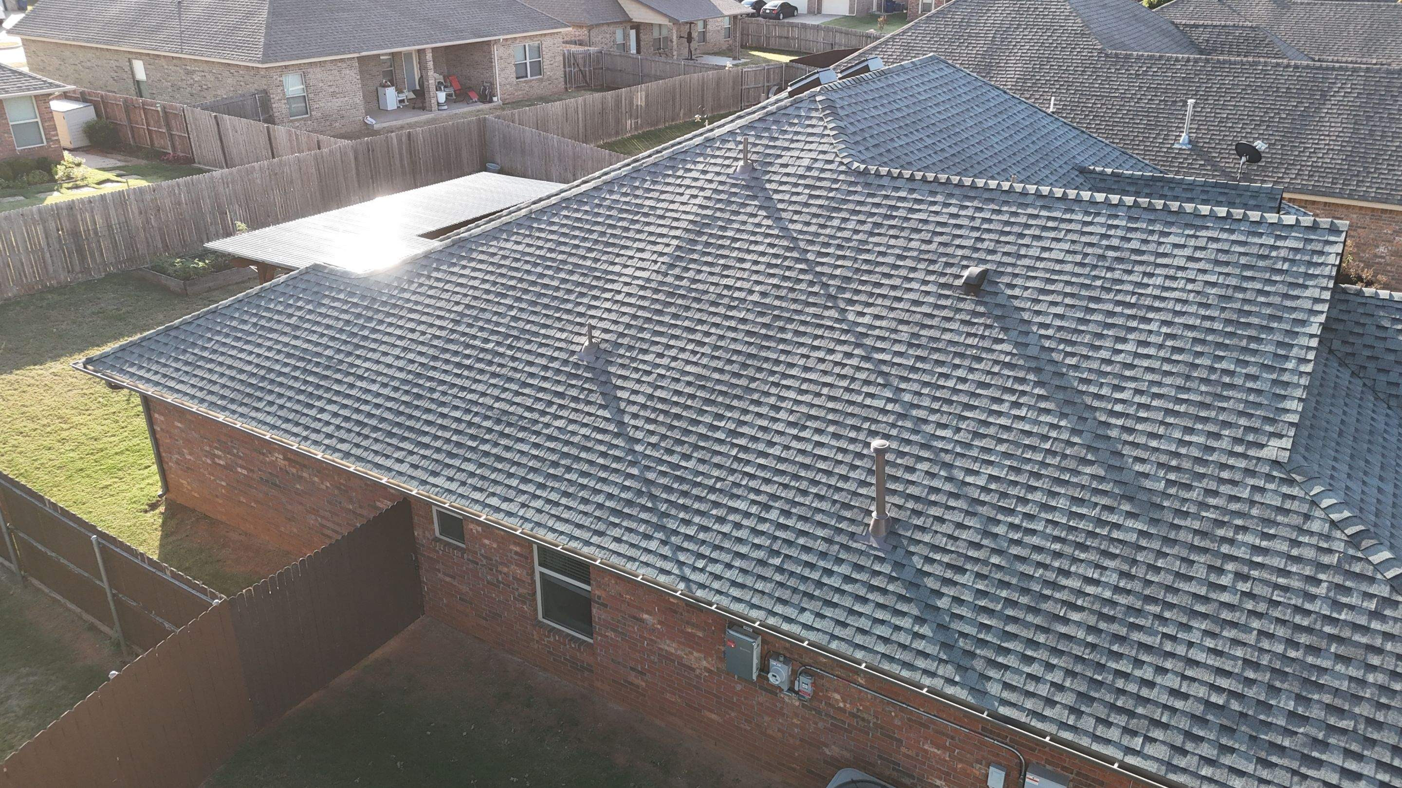 Roof Replacement in Mustang, OK by 5Coat Roofing & Construction