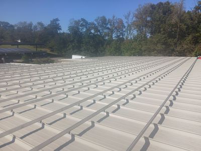 Commercial Roof using GACO Flex Silicone and Metal Acrylic