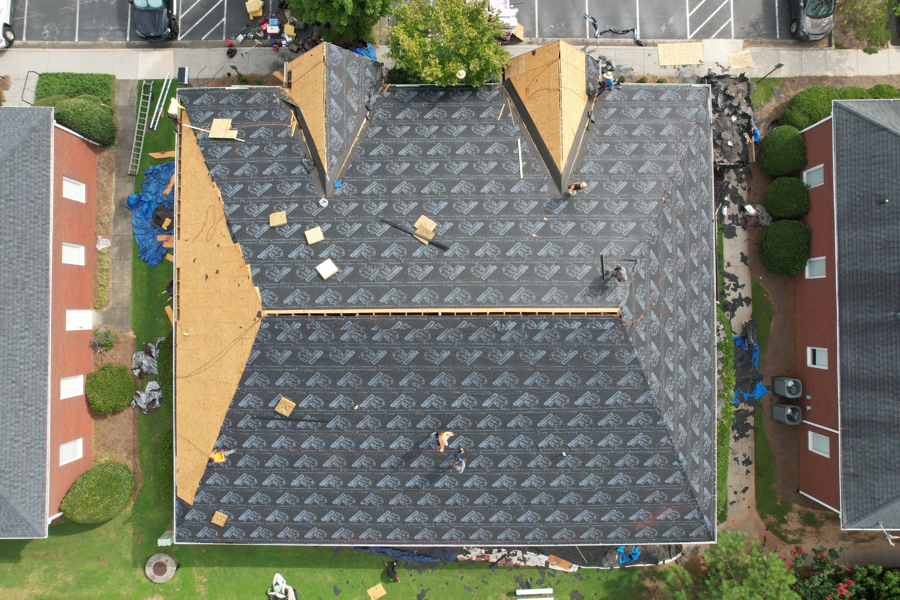 Commercial Roof Replacement using Owens Corning by Inspector Roofing and Restoration