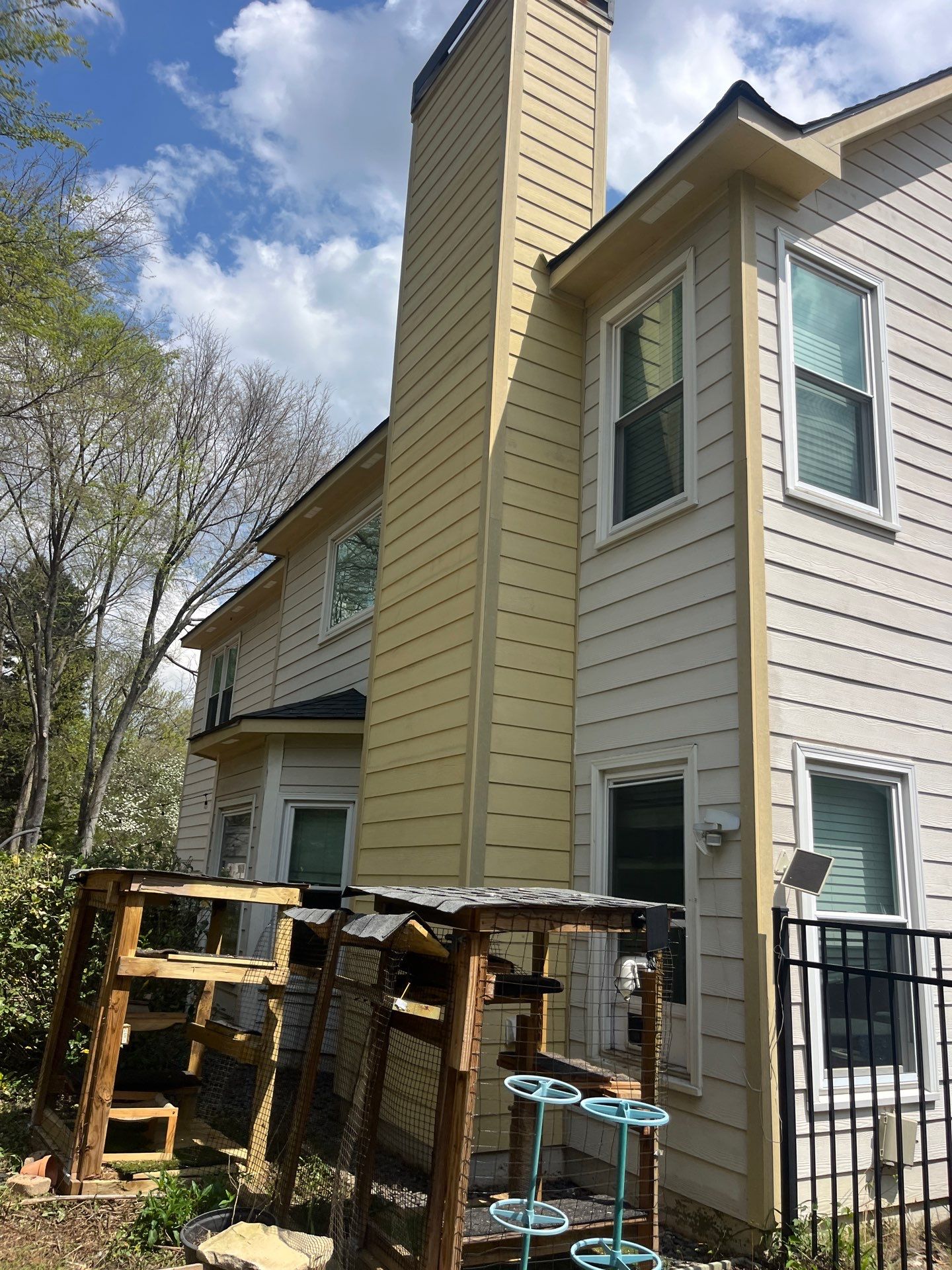 Marietta, GA Chimney Siding, Fascia, and Soffit Replacement using James Hardie Lap Siding, Hardie Trim, and Hardie Panel by Nelson Exteriors 
